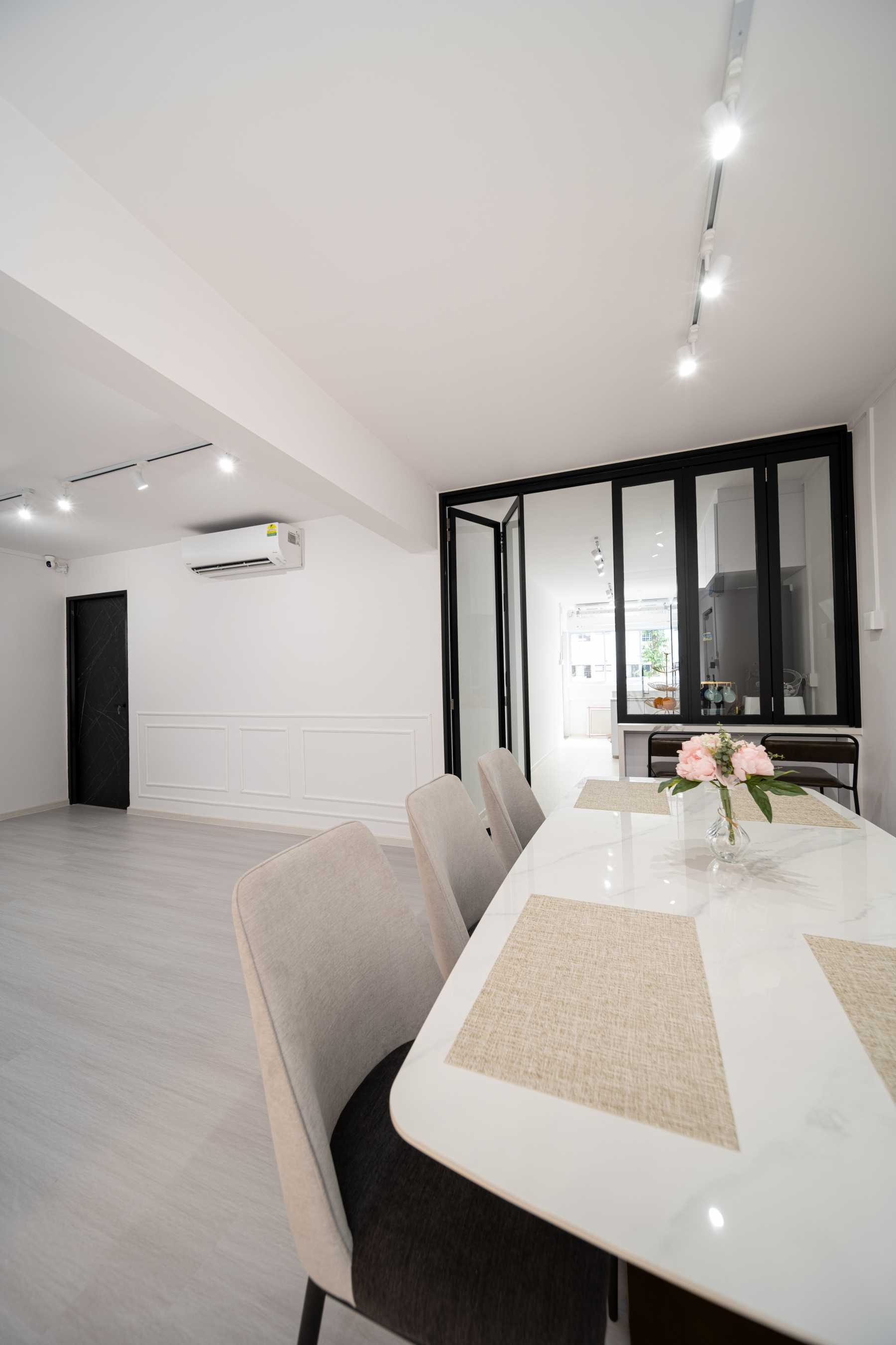 Scandinavian Dining Room with Drop Light and Cove Lighting