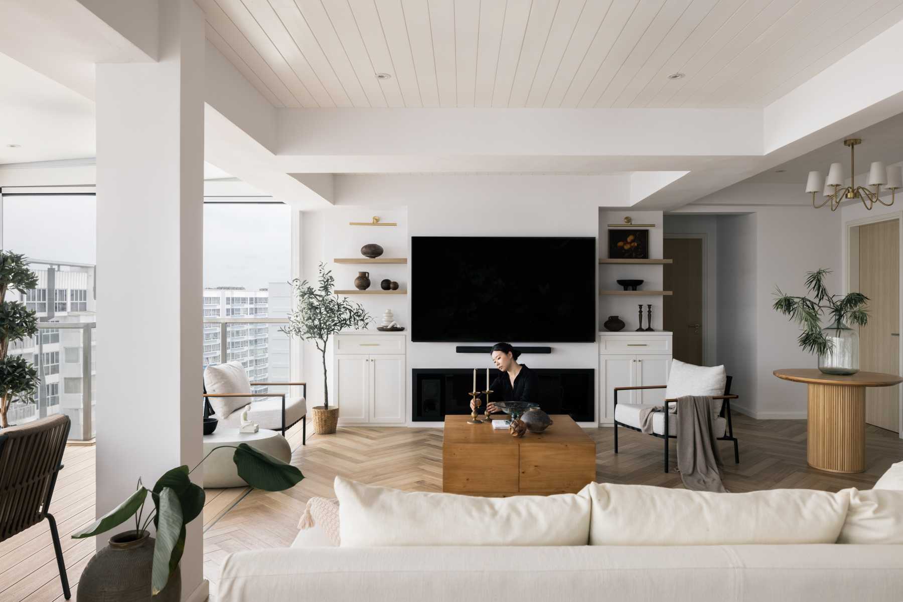 Modern Living Room with Herringbone Tiling and Chandelier