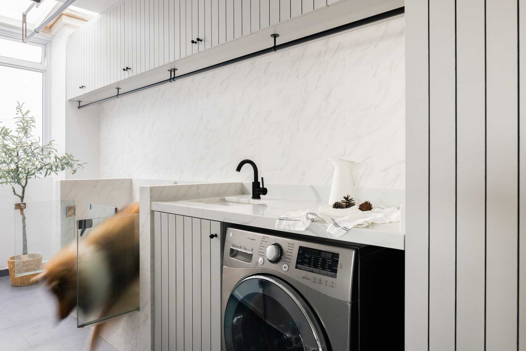 Modern Service Yard with Washing Machine and Laundry Area