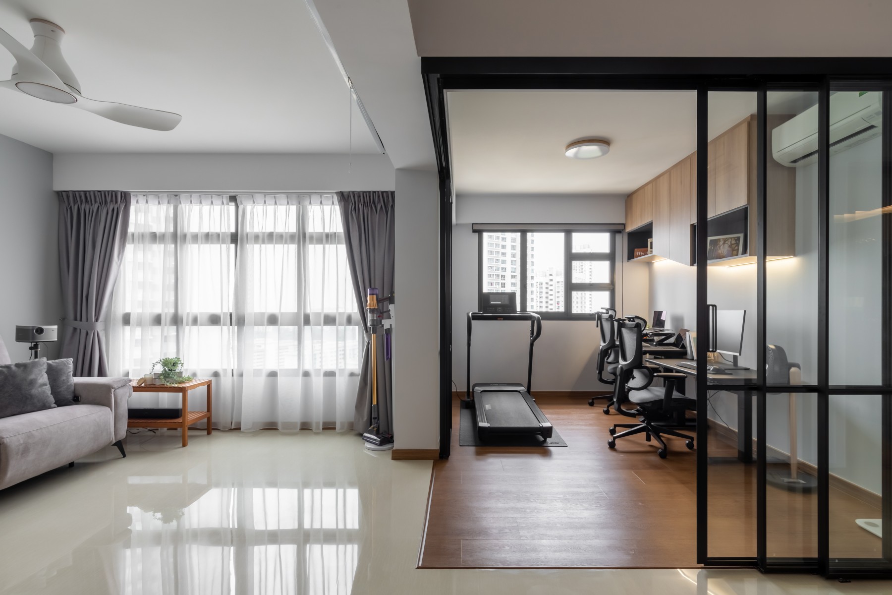 Scandinavian Home Office with Bookshelf and Desk Chairs