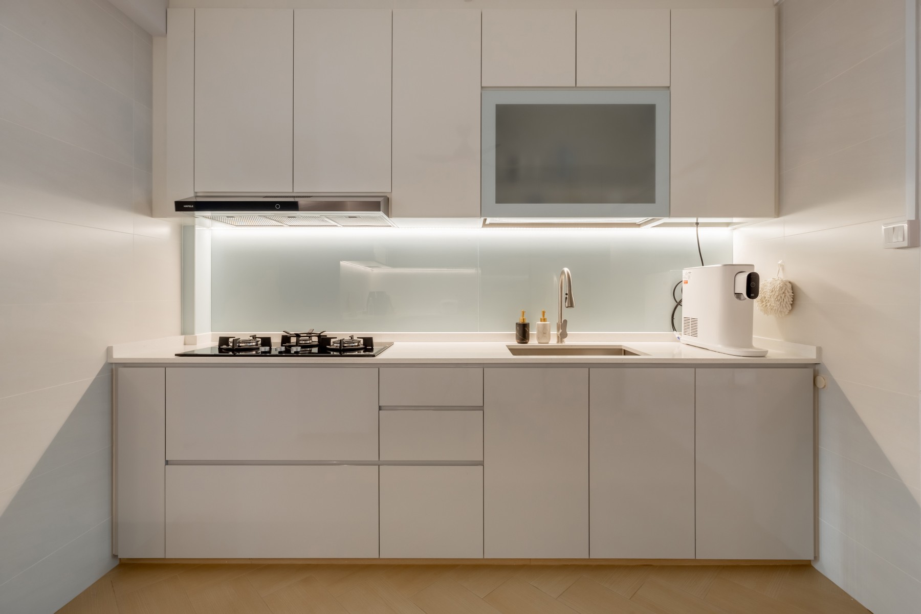 Minimalist Kitchen with Countertop and Herringbone Tiling