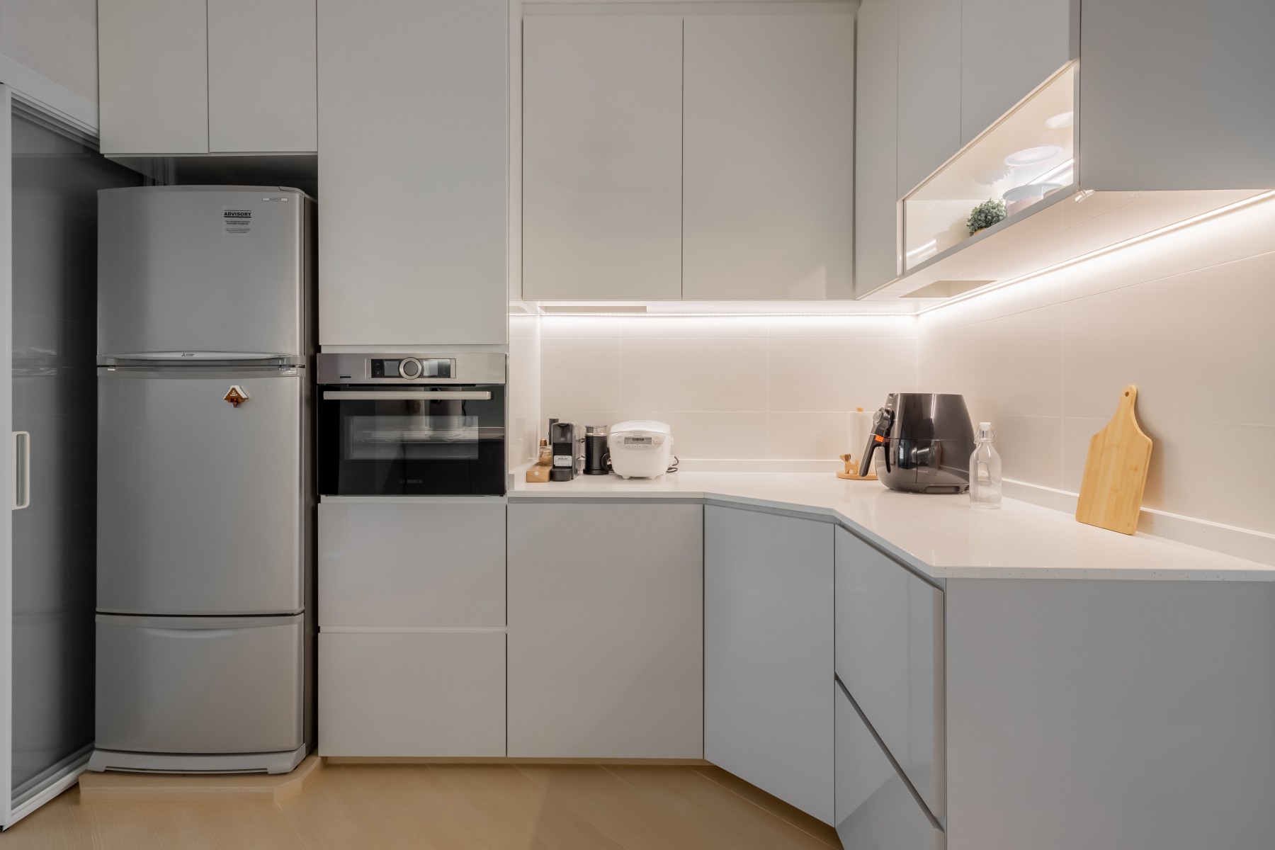 Minimalist Kitchen with Countertop and Herringbone Tiling