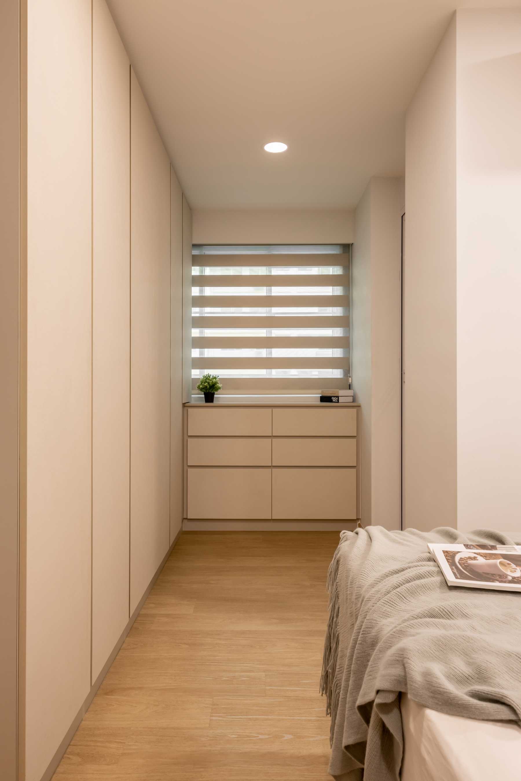 Minimalist Bedroom with Vinyl Flooring and Wardrobe