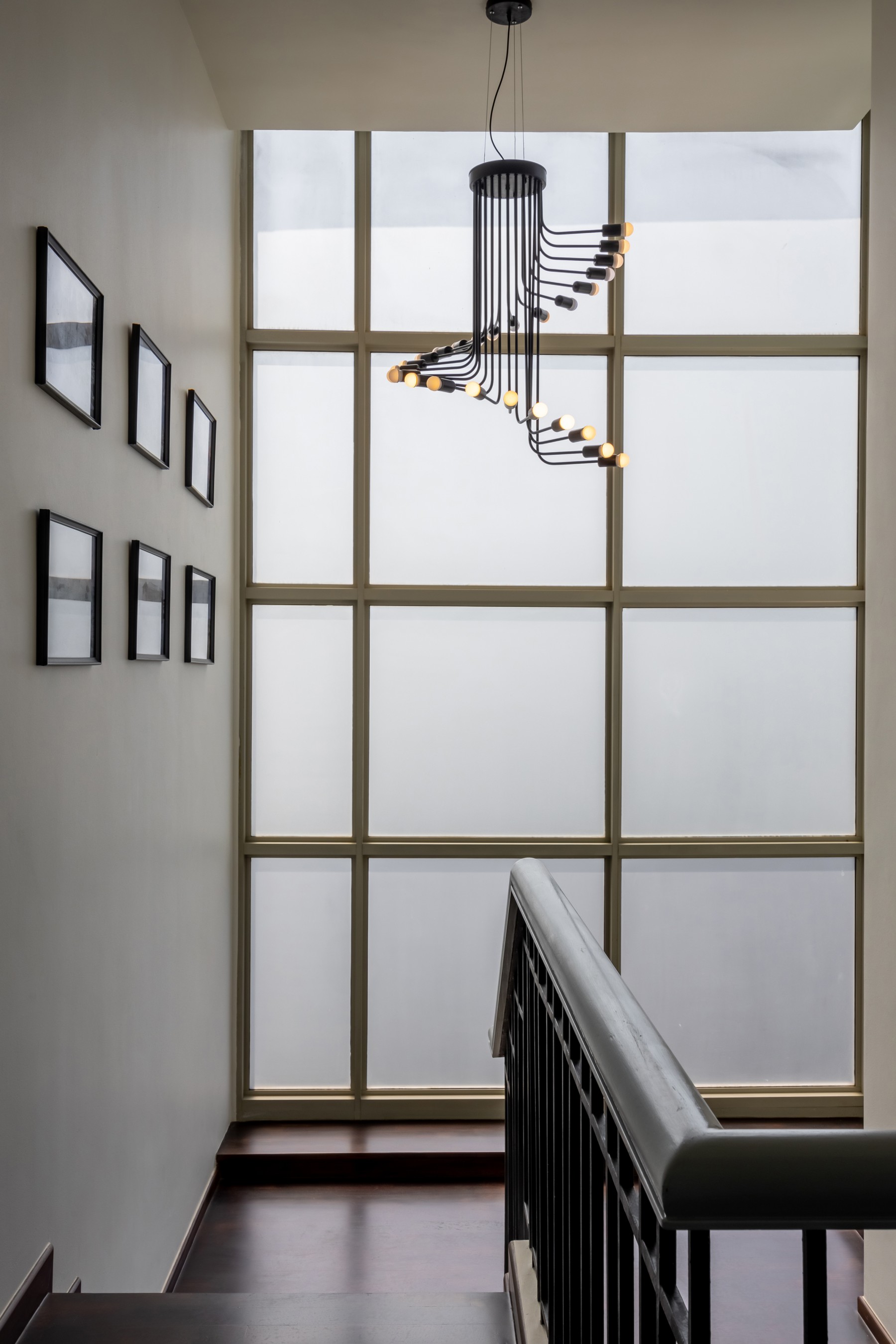 Eclectic Hallway with Artwork and Paintings