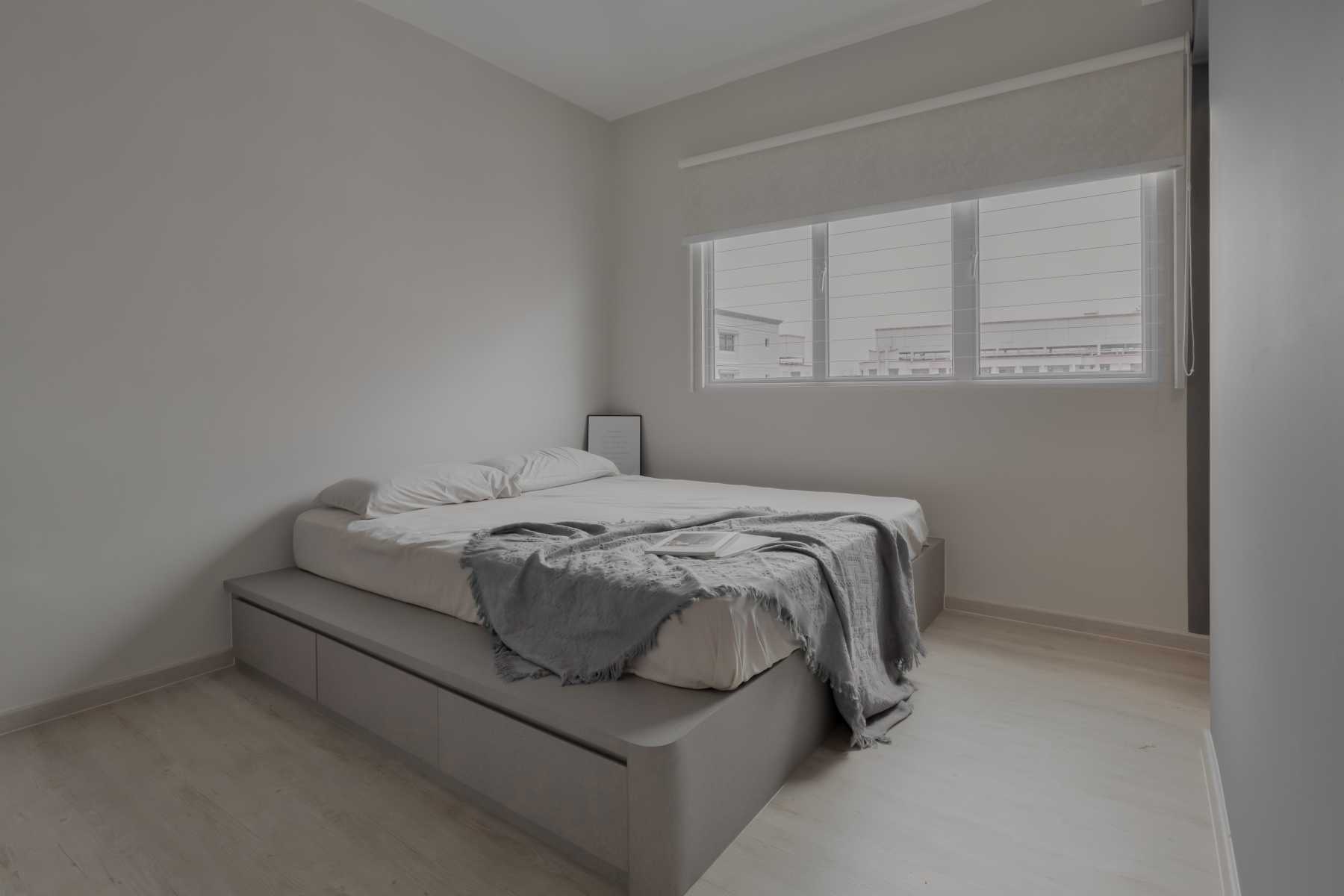 Scandinavian Bedroom with Wood Flooring and Window Shutters