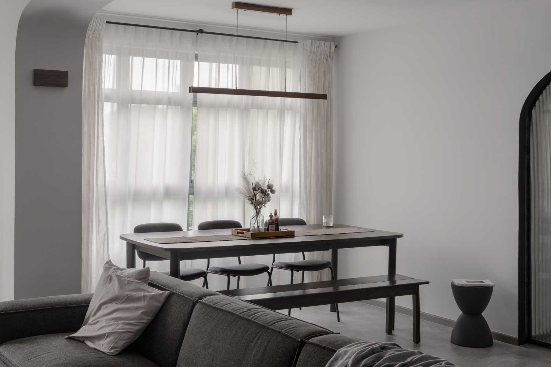 Contemporary Living Room with Sofa and Dining Table