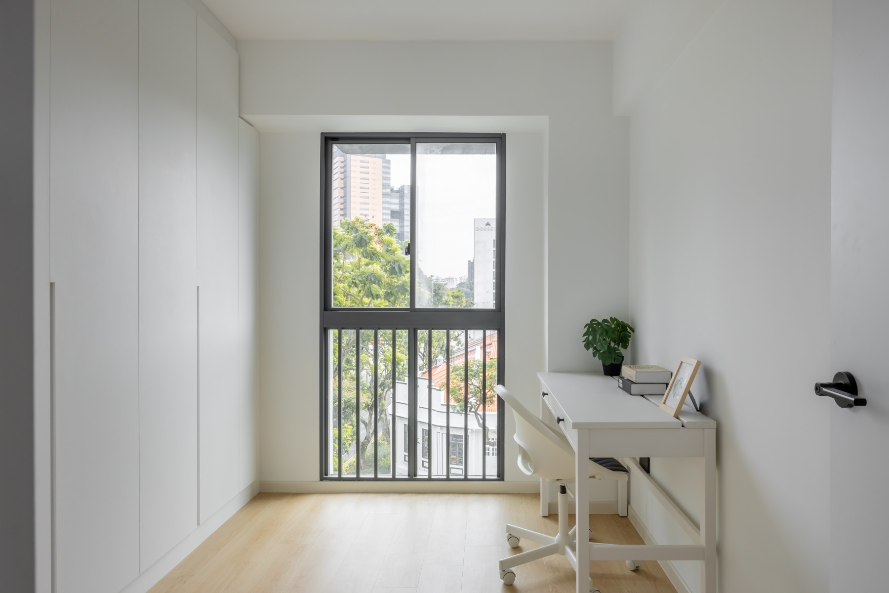 Minimalist Study with Vinyl Flooring and Ceiling Light