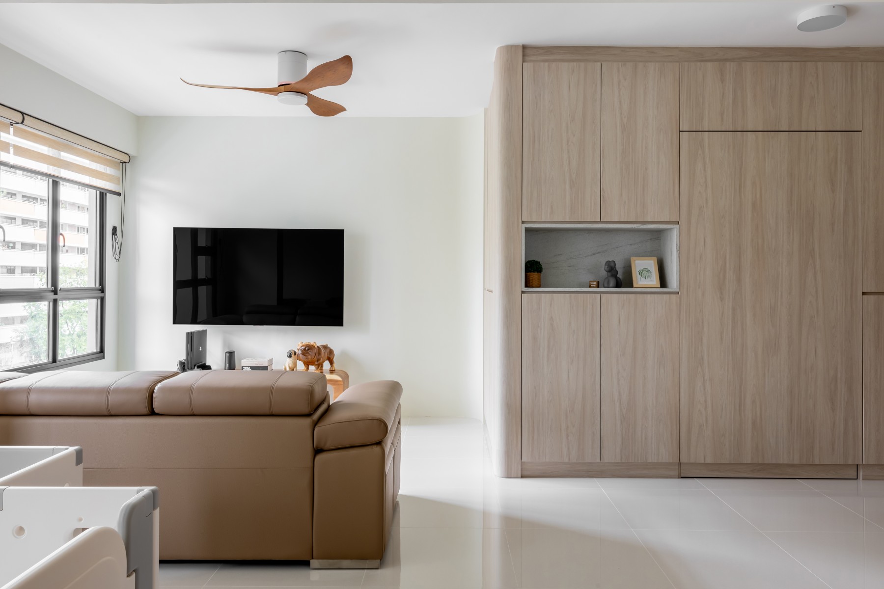 Minimalist Living Room with Homogeneous Tiles and Ceiling Fan