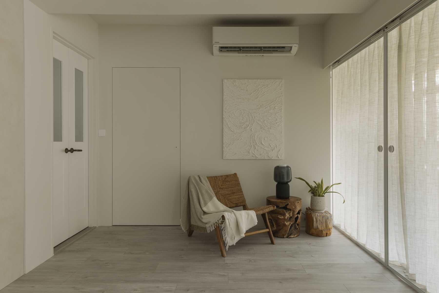 Minimalist Living Room with Artwork and Bedside Table