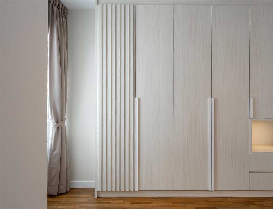 Contemporary Bedroom with Parquet Floor and Cove Lighting