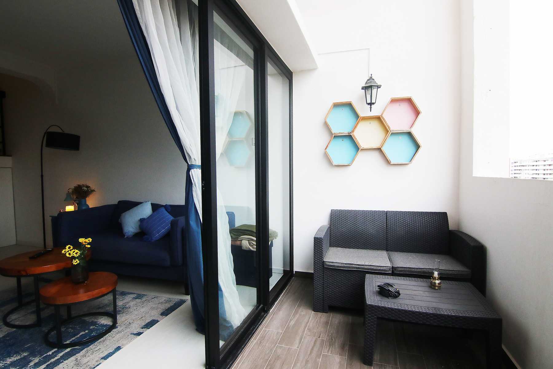 Scandinavian Balcony with Wall Shelves and Outdoor Lighting