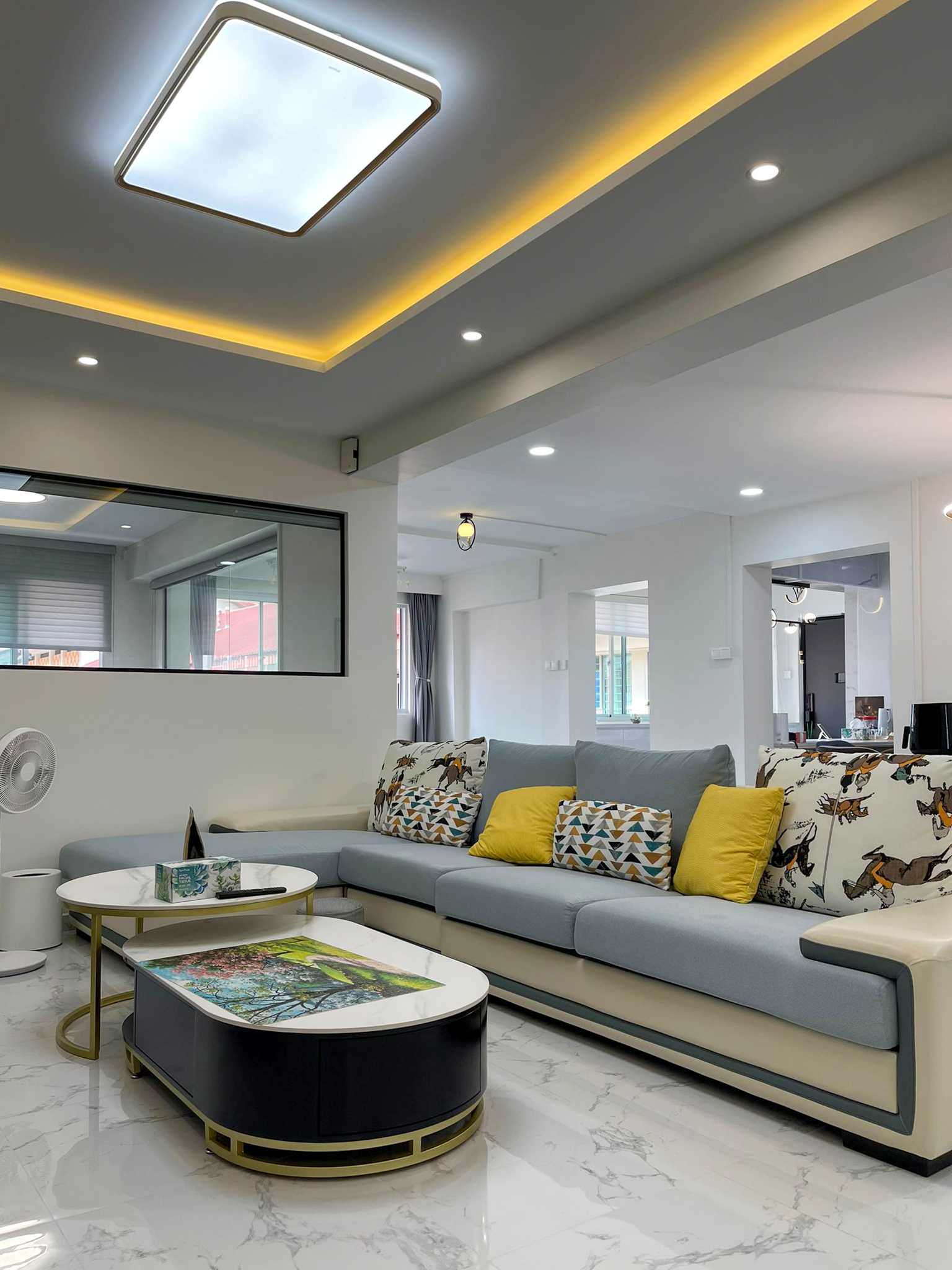 Modern Living Room with Cove Lighting and Ceiling Light