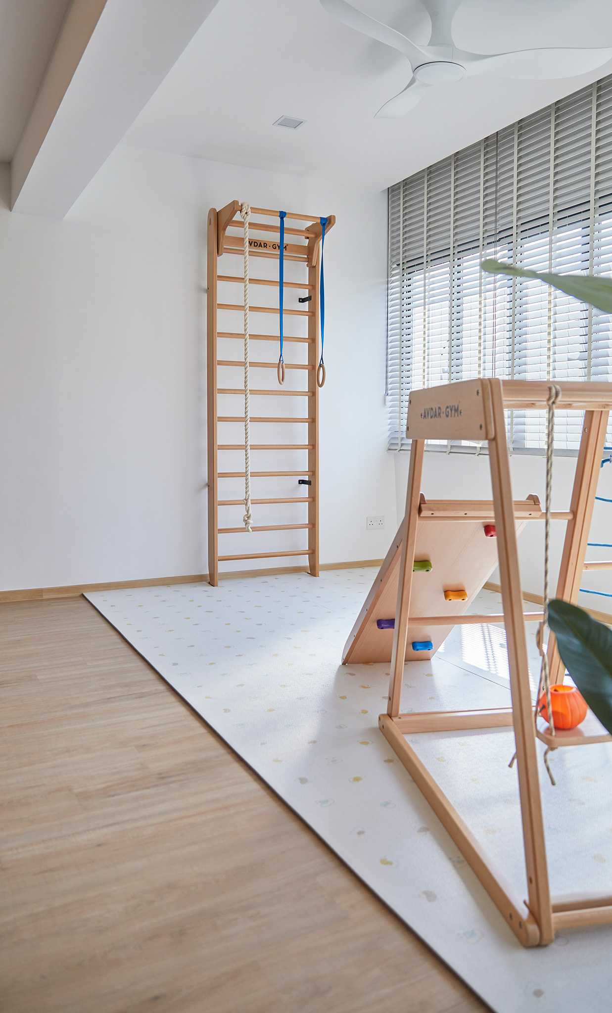 Scandinavian Gaming Room with Window Grille and Paintings