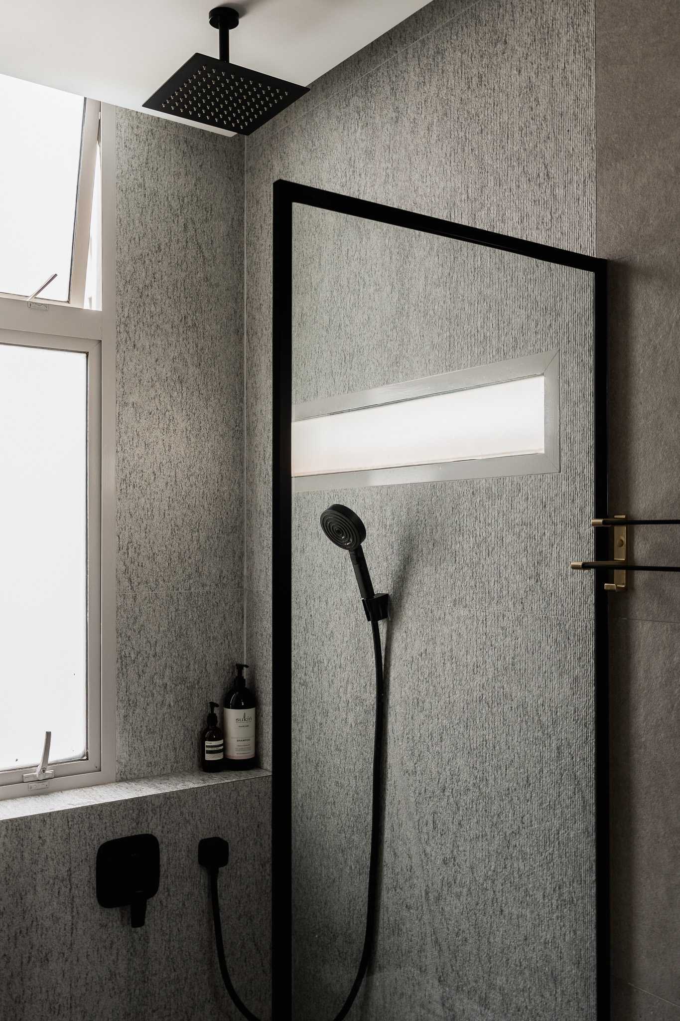 Minimalist Bathroom with Rainshower and Bathroom Storage