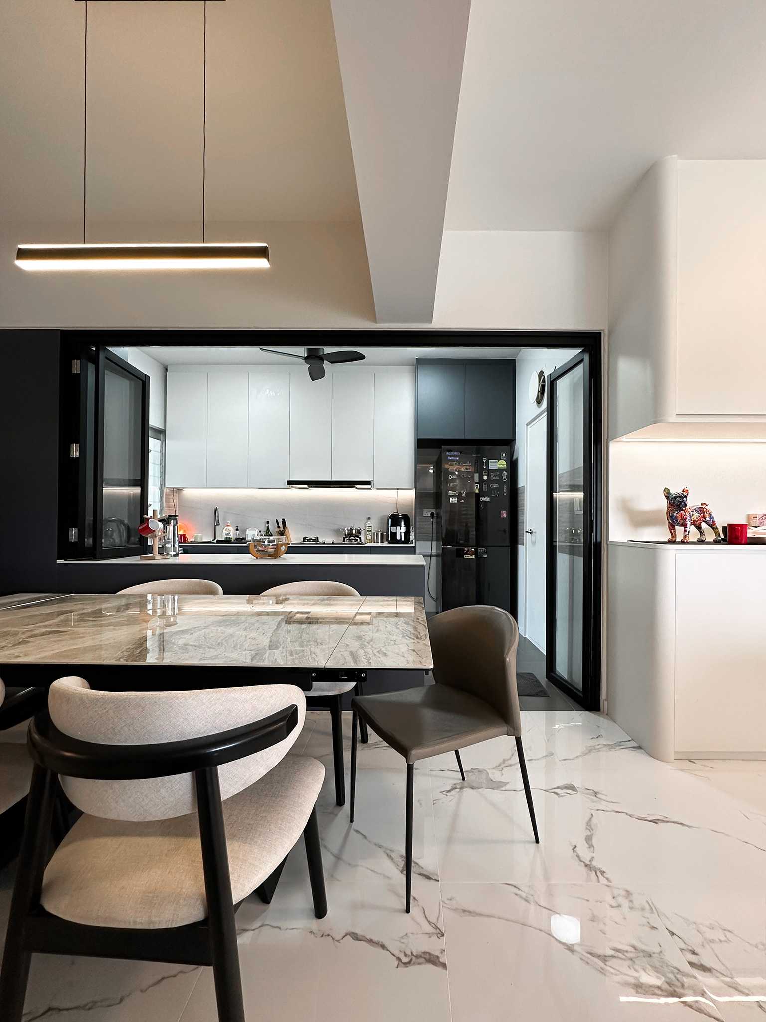 Scandinavian Dining Room with Glass Door and Dining Table