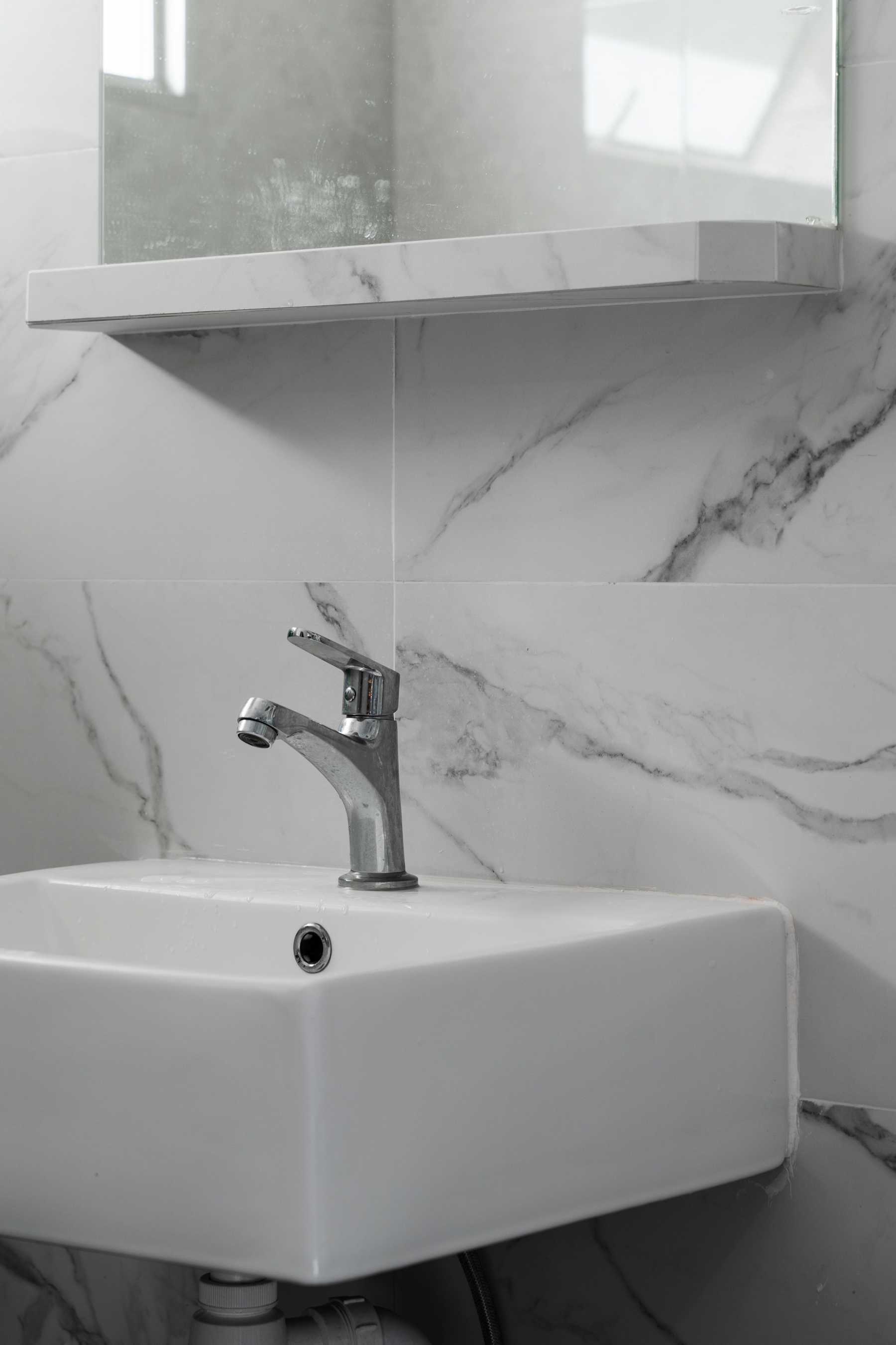 Contemporary Bathroom with Wood Flooring and Mirror