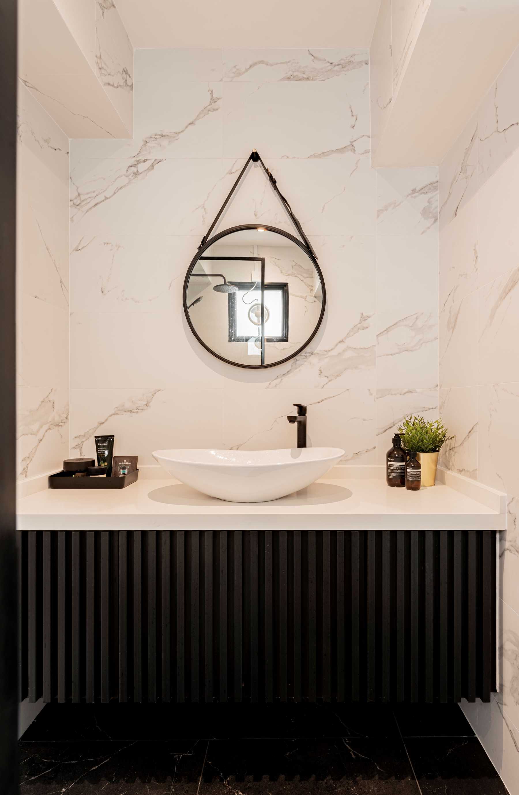 Minimalist Bathroom with Countertop and Mirror