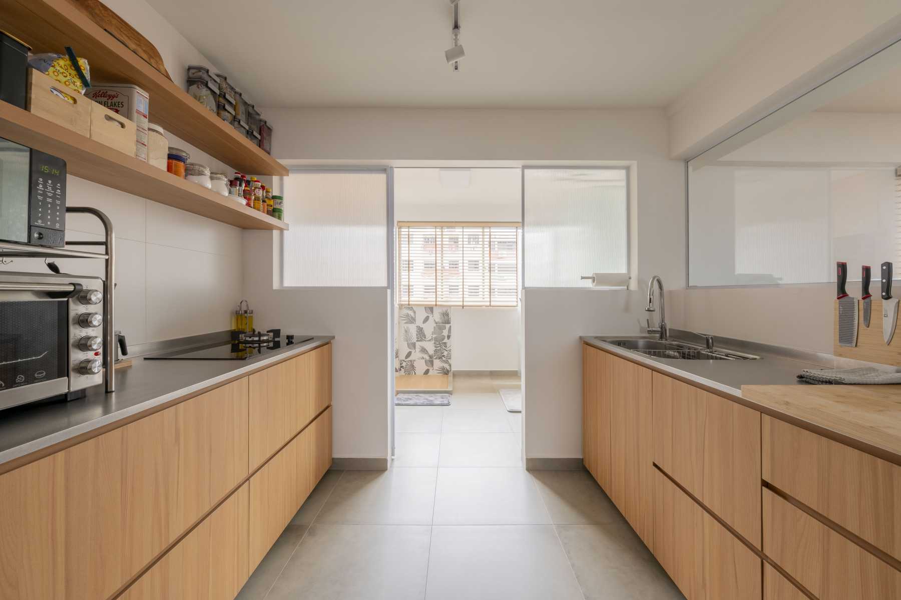 Scandinavian Kitchen with Homogeneous Tiles and Cement Floor