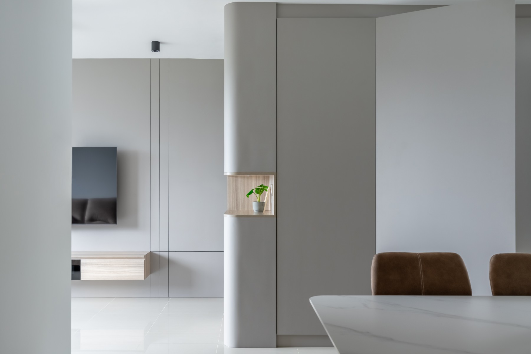 Contemporary Living Room with Homogeneous Tiles and TV Console