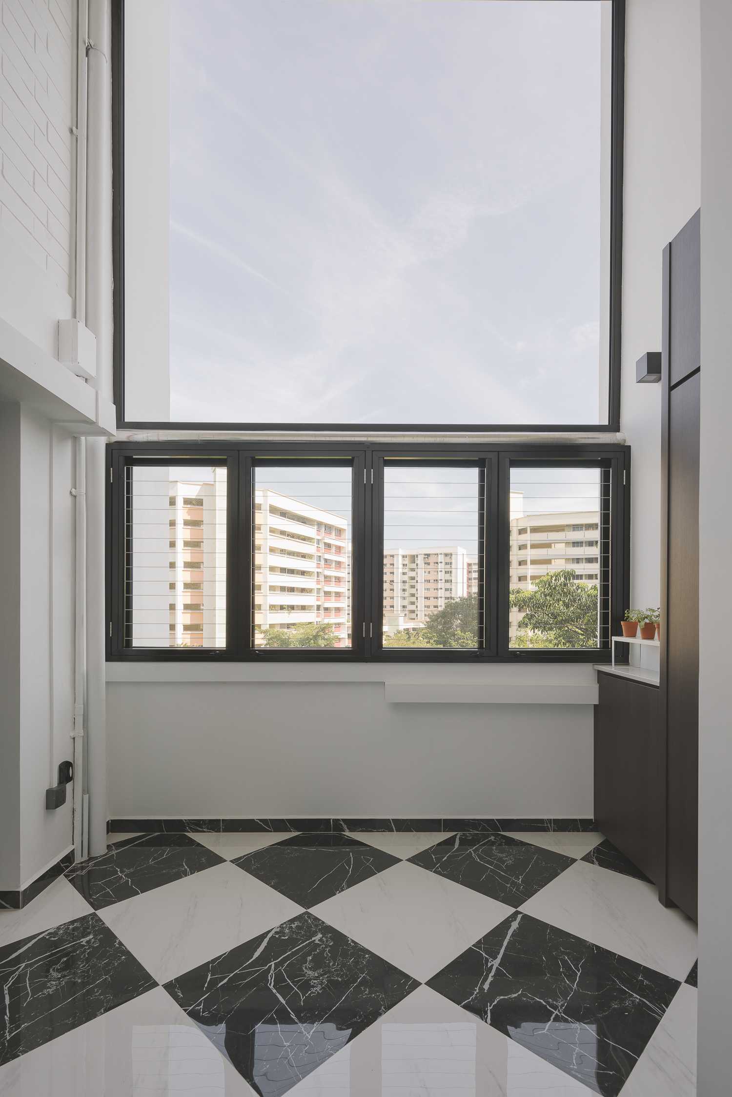 Modern Balcony with Marble Floor and Window Shutters