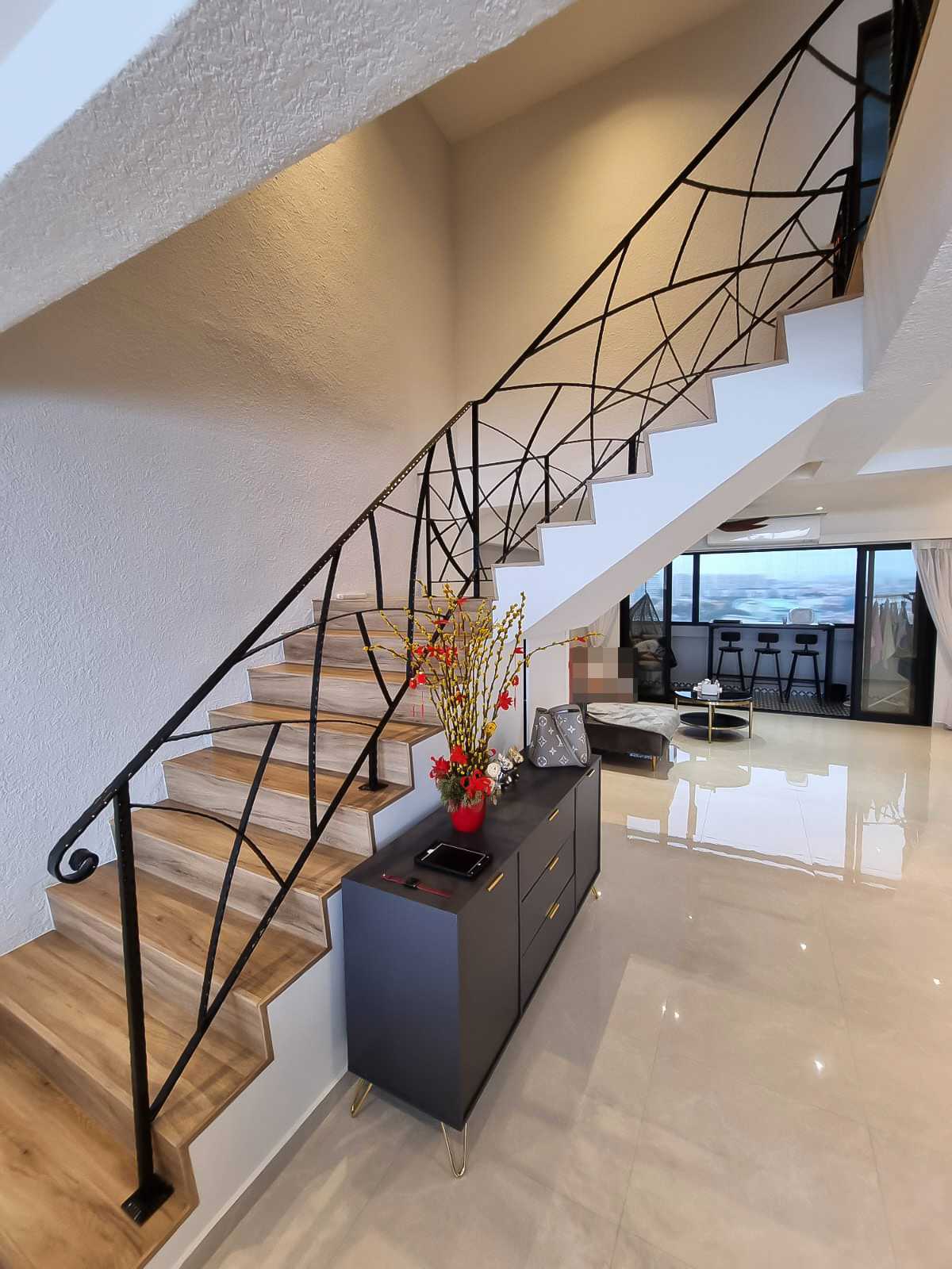 Scandinavian Hallway with Staircase and Paintings