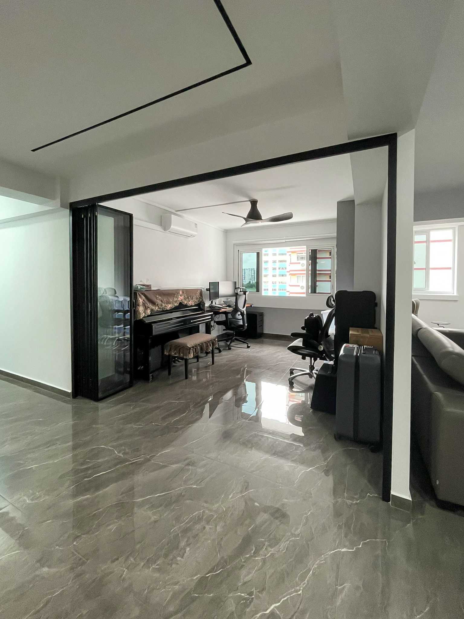 Scandinavian Living Room with Glass Door and Window Grille