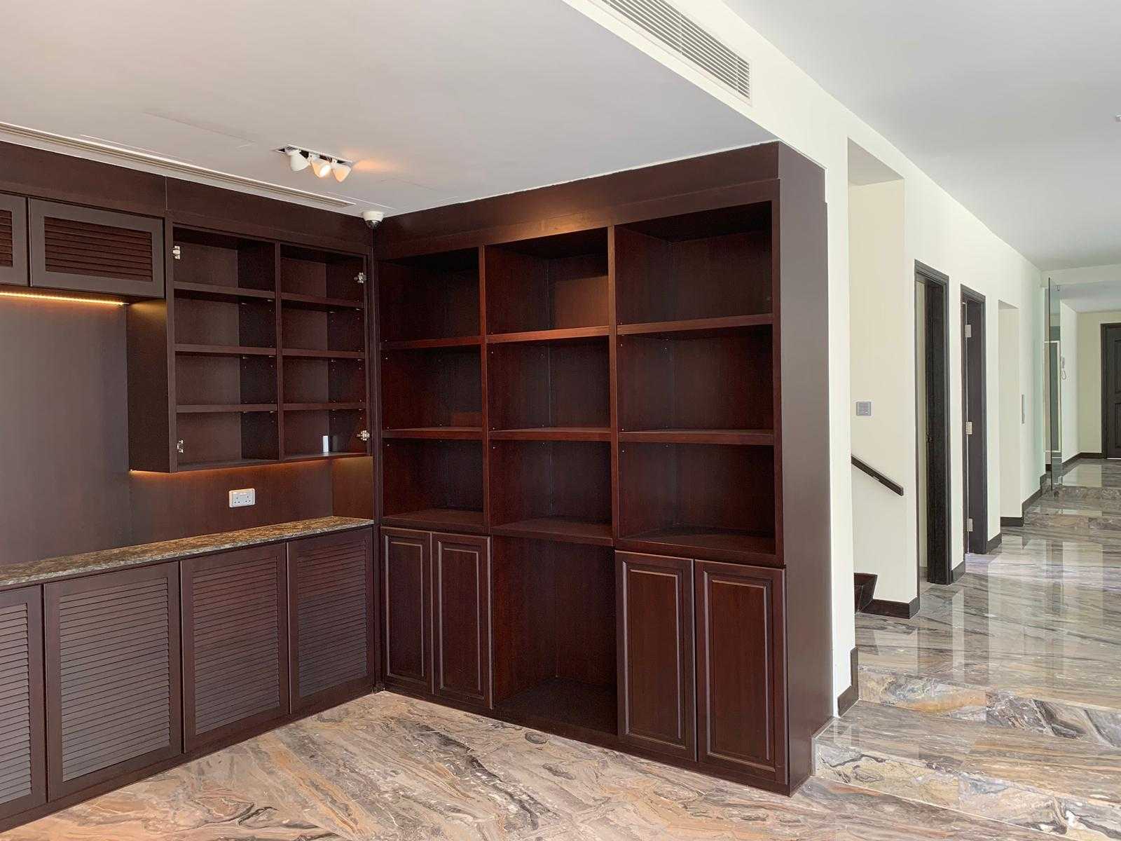 Modern Foyer with Marble Floor and Feature Wall