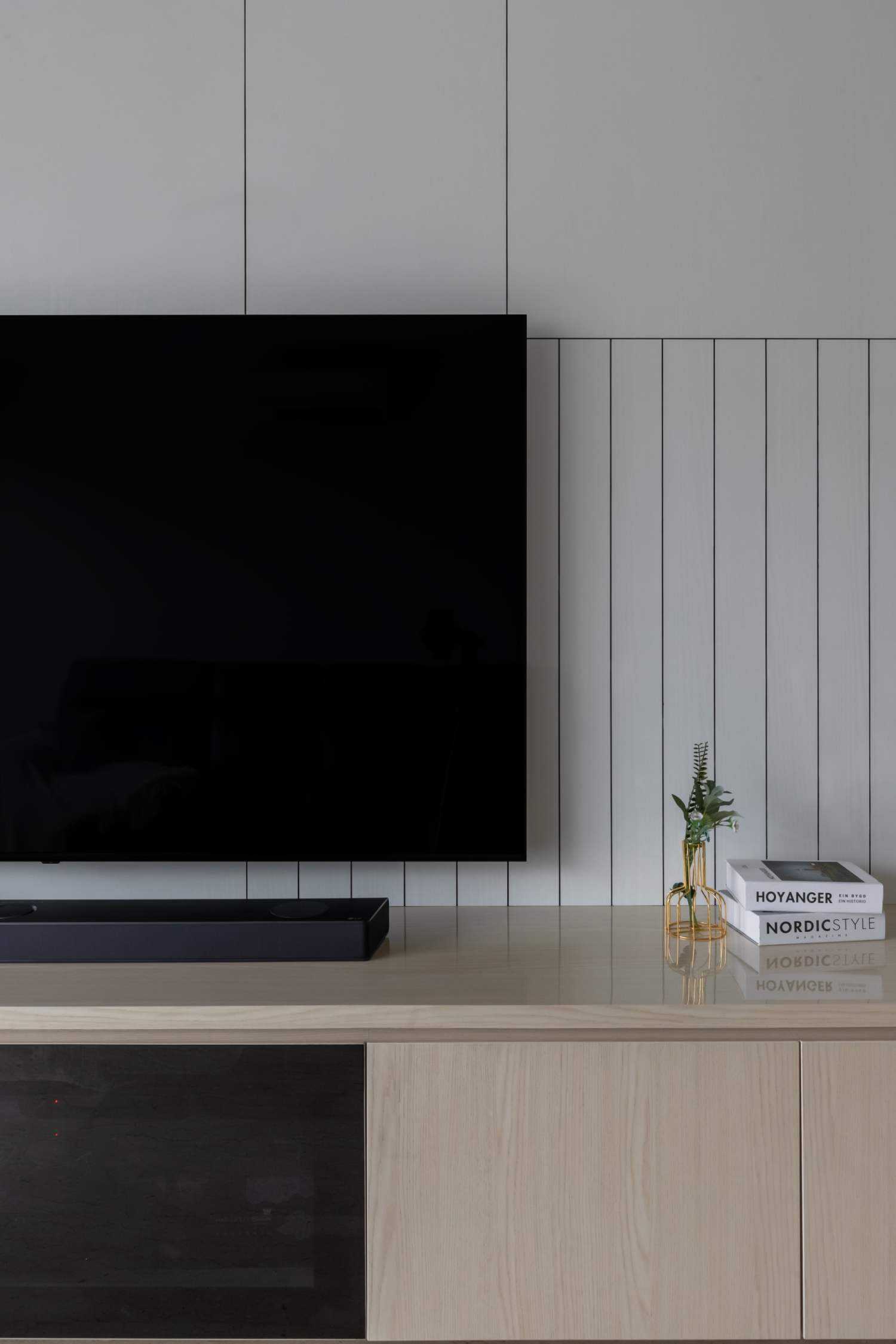 Minimalist Living Room with TV Console and Feature Wall