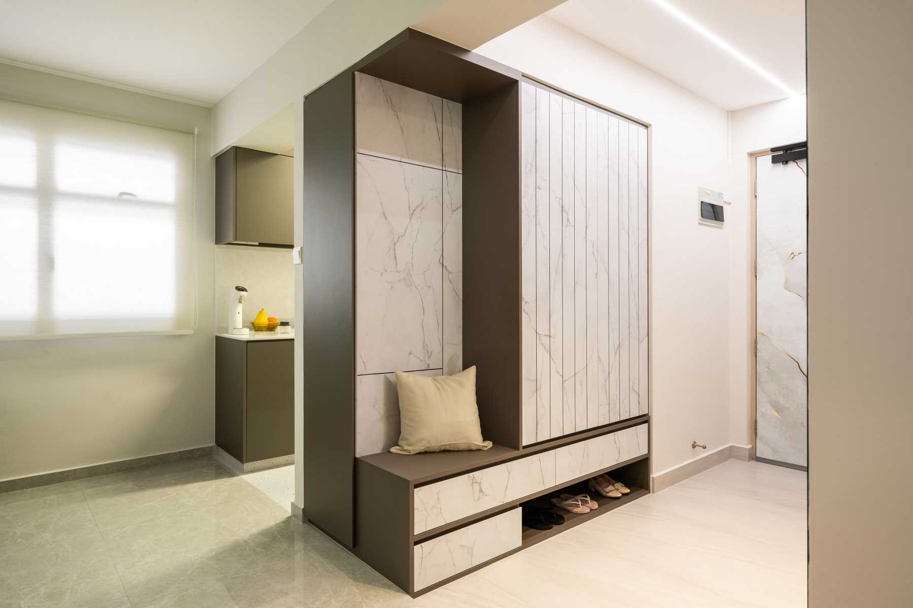 Modern Entryway with Artwork and Seating Bench