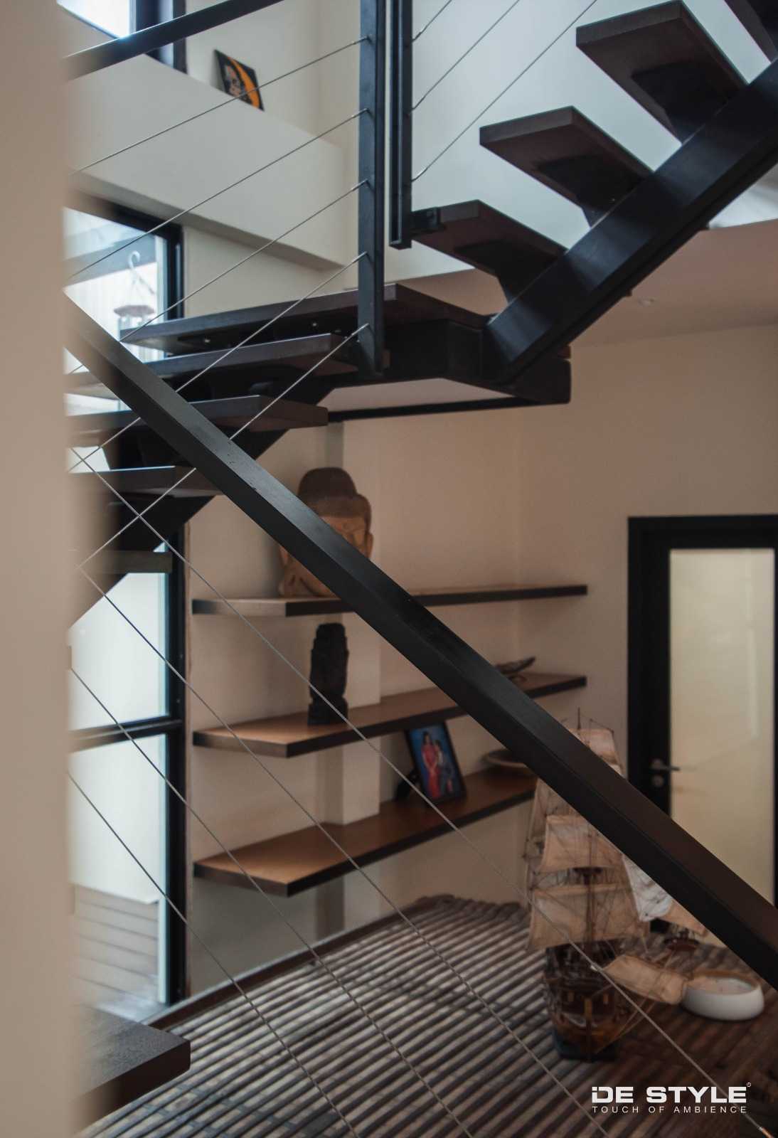 Asian Hallway with Staircase and Display Cabinets