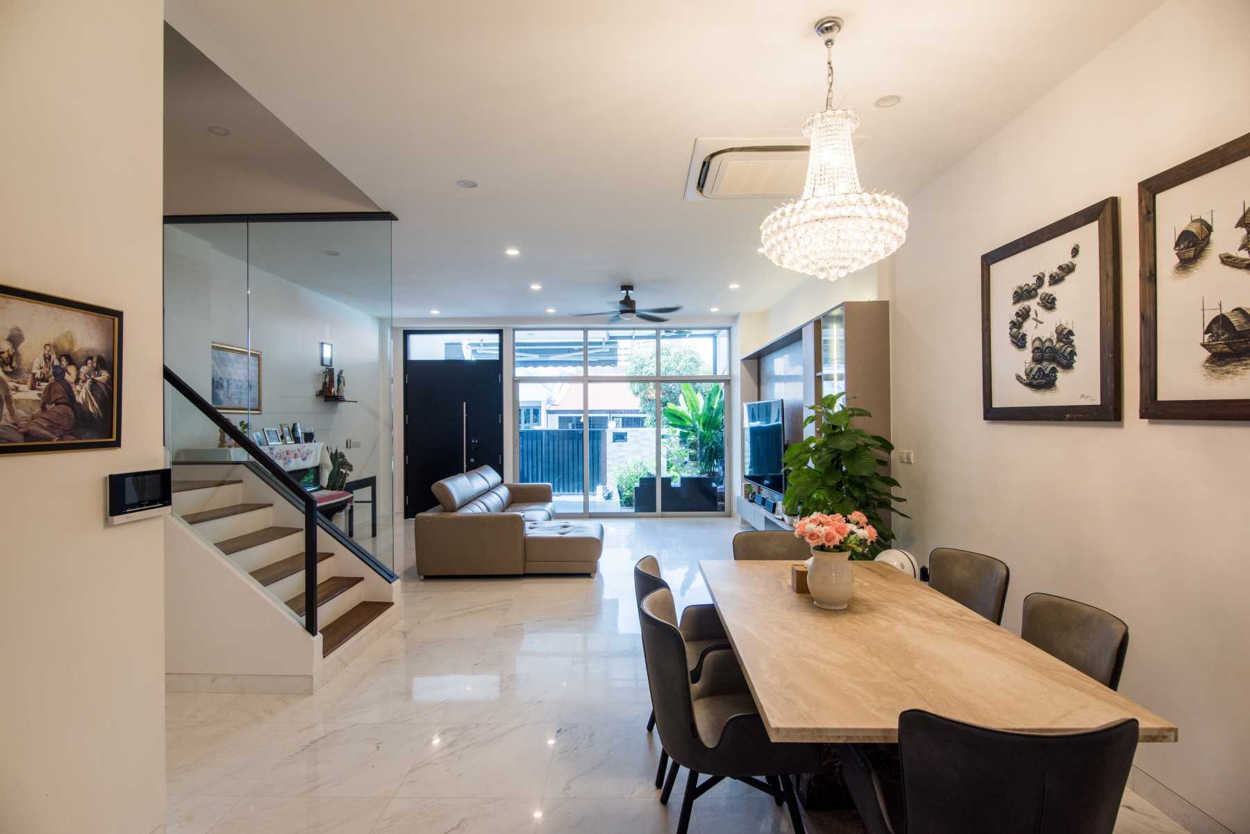 Contemporary Dining Room with Chandelier and Dining Table