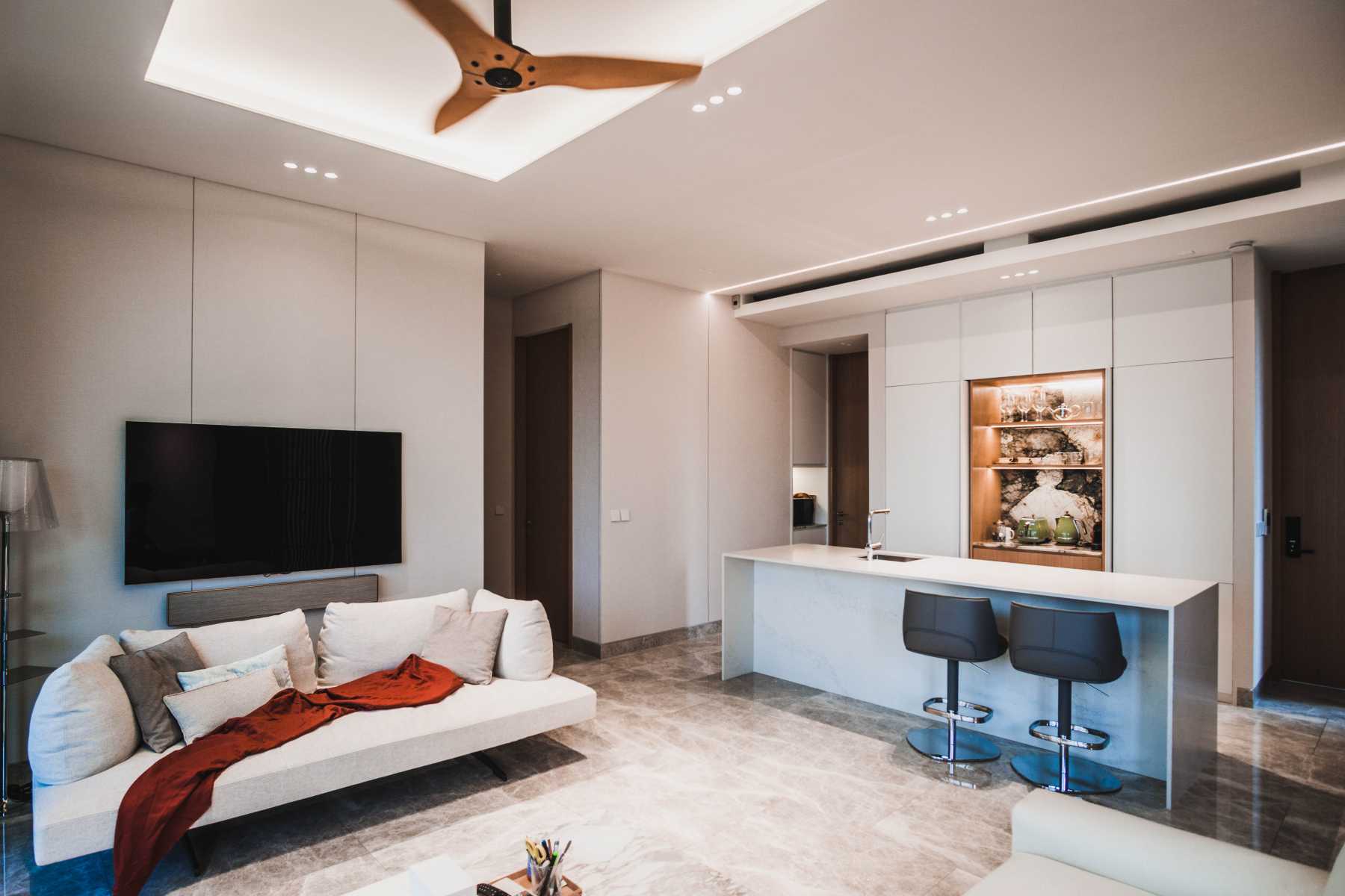 Minimalist Living Room with Kitchen Island and Sofa