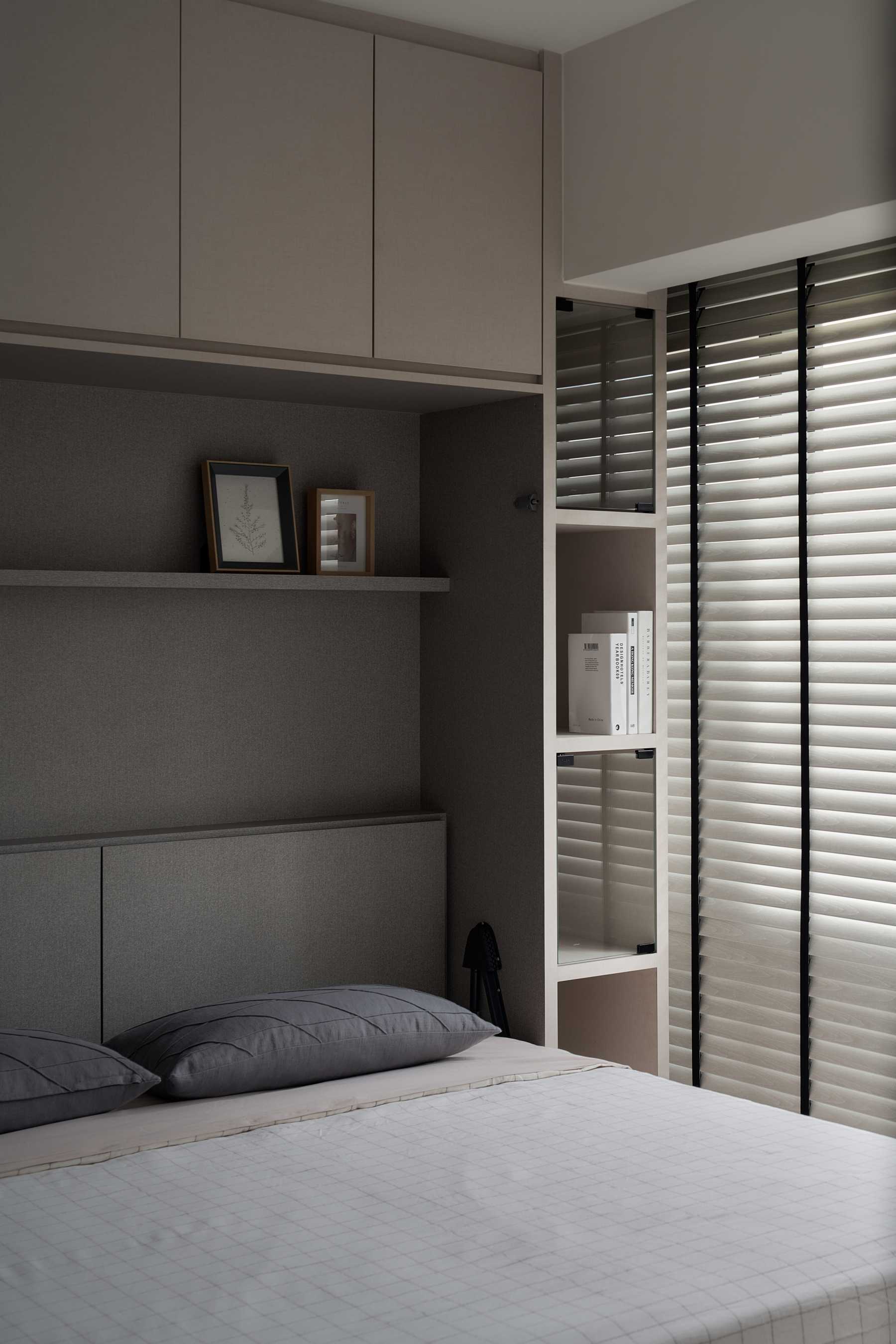 Modern Bedroom with Bookshelf and Platform Bed