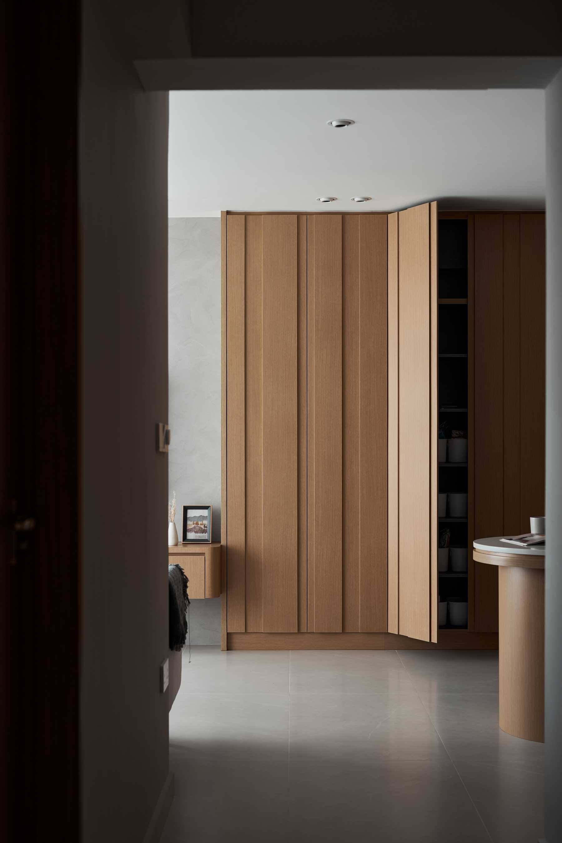 Scandinavian Living Room with Bookshelf and Ceiling Light
