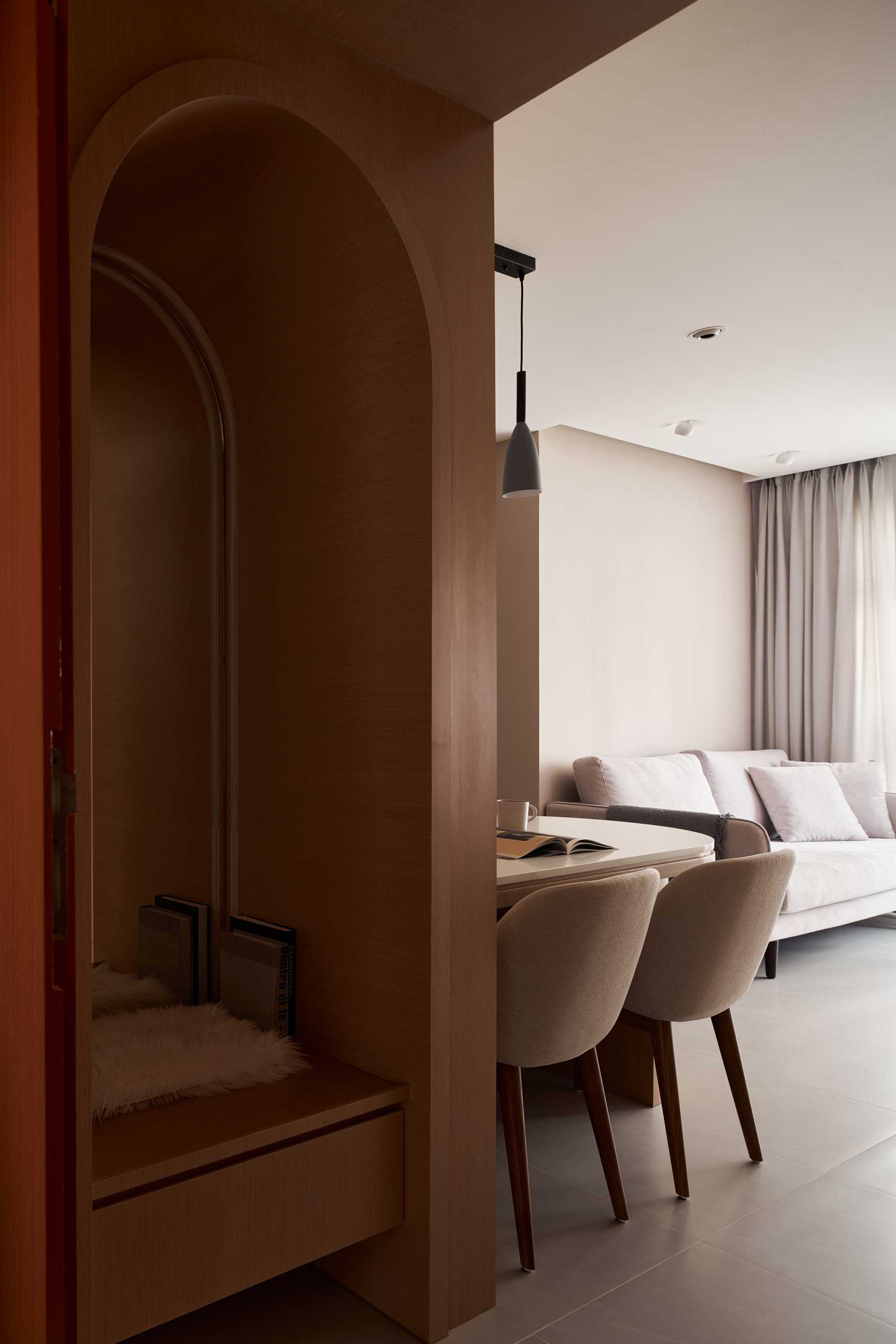 Scandinavian Foyer with Mirror and Artwork