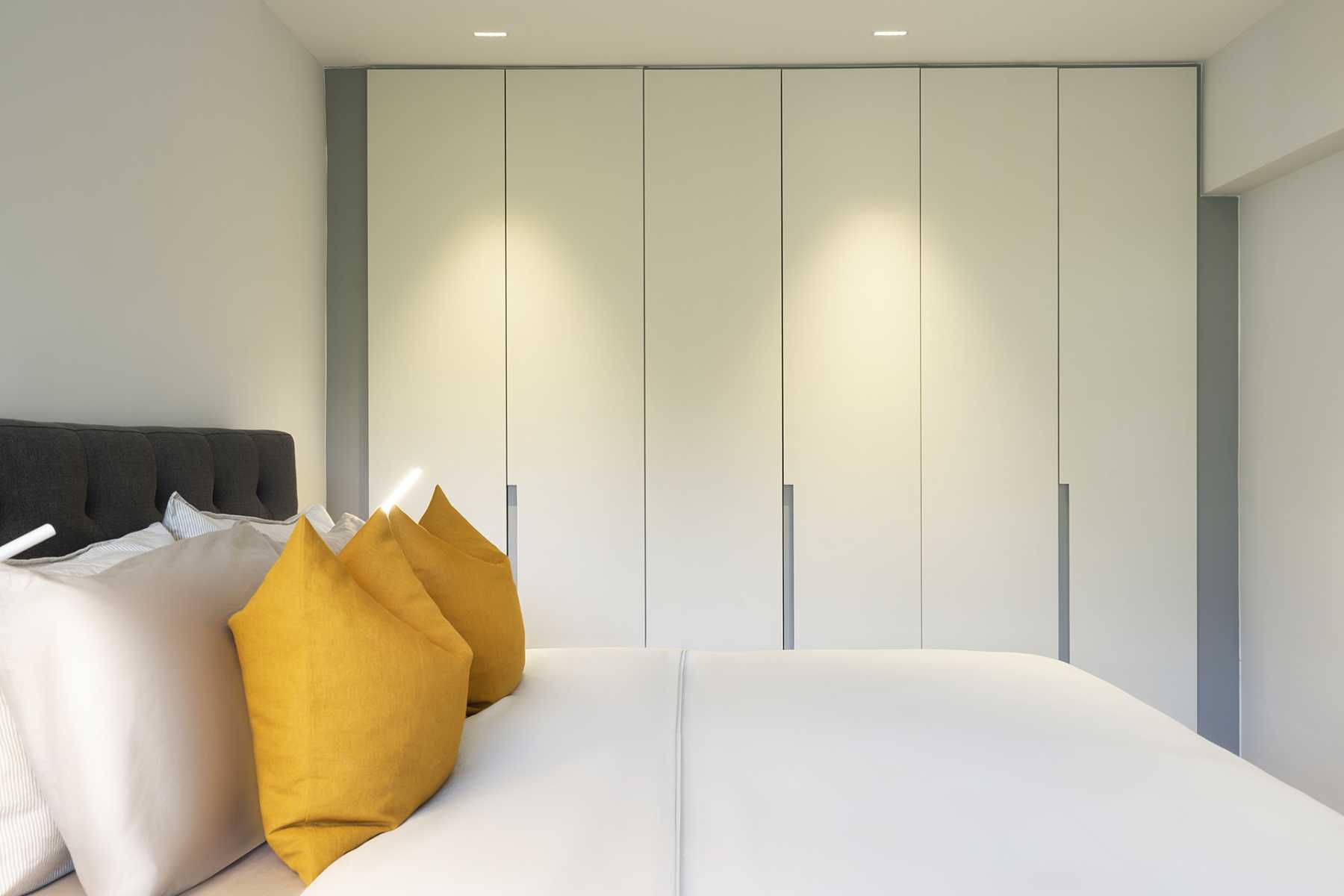 Contemporary Bedroom with Vinyl Flooring and Wardrobe