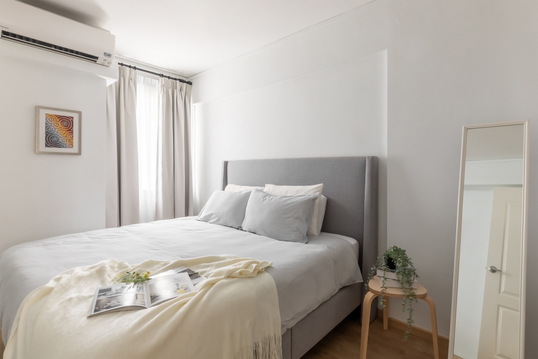 Contemporary Bedroom with Vinyl Flooring and Mirror