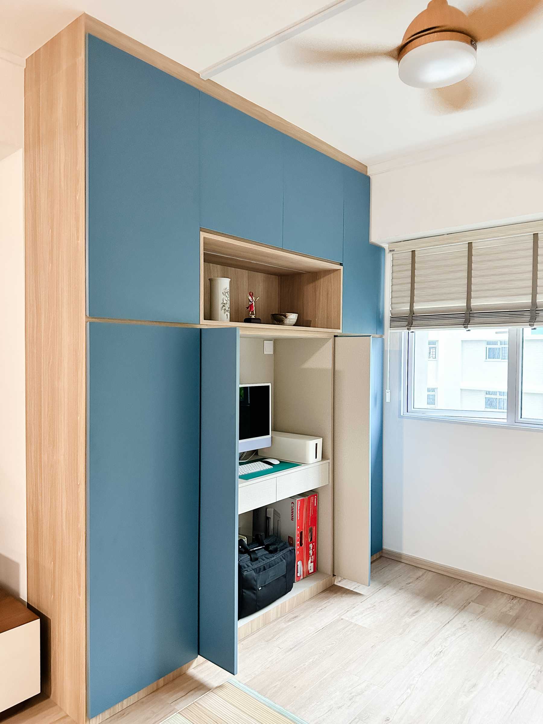 Modern Study with Bookshelf and Roller Blinds