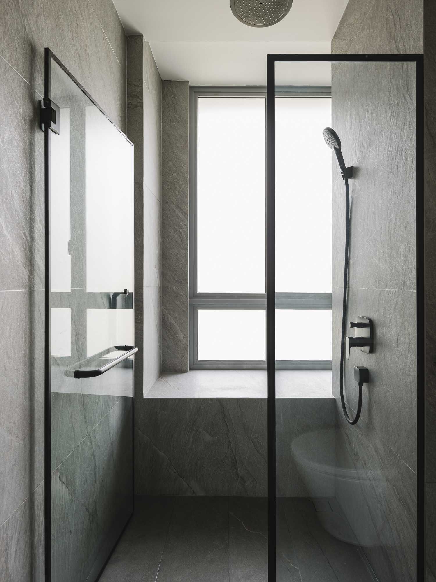 Modern Bathroom with Glass Door and Window Seat