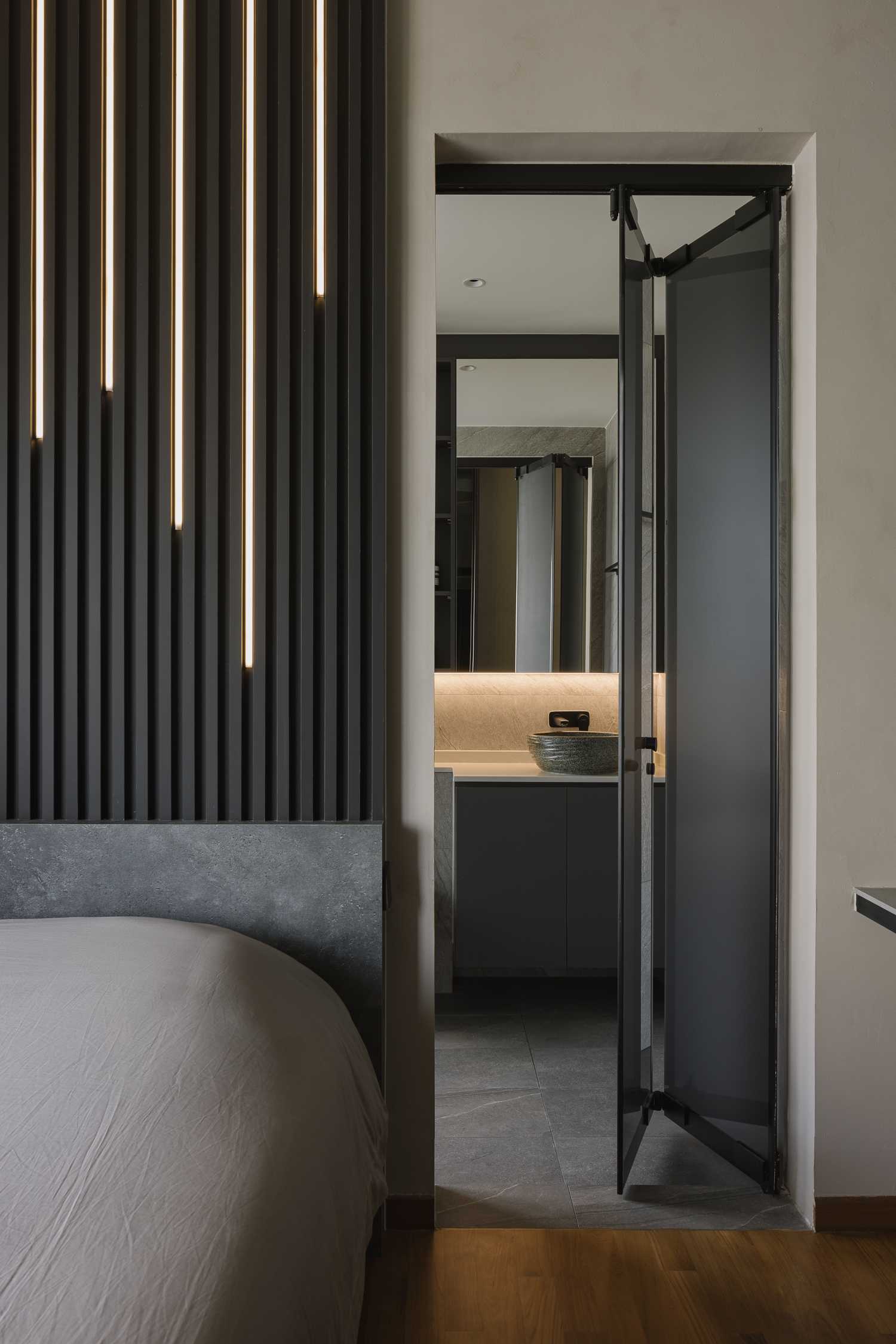Modern Bedroom with Feature Wall and Mirror