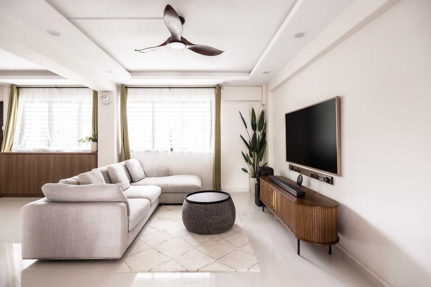 Modern Living Room with TV Console and Cove Lighting