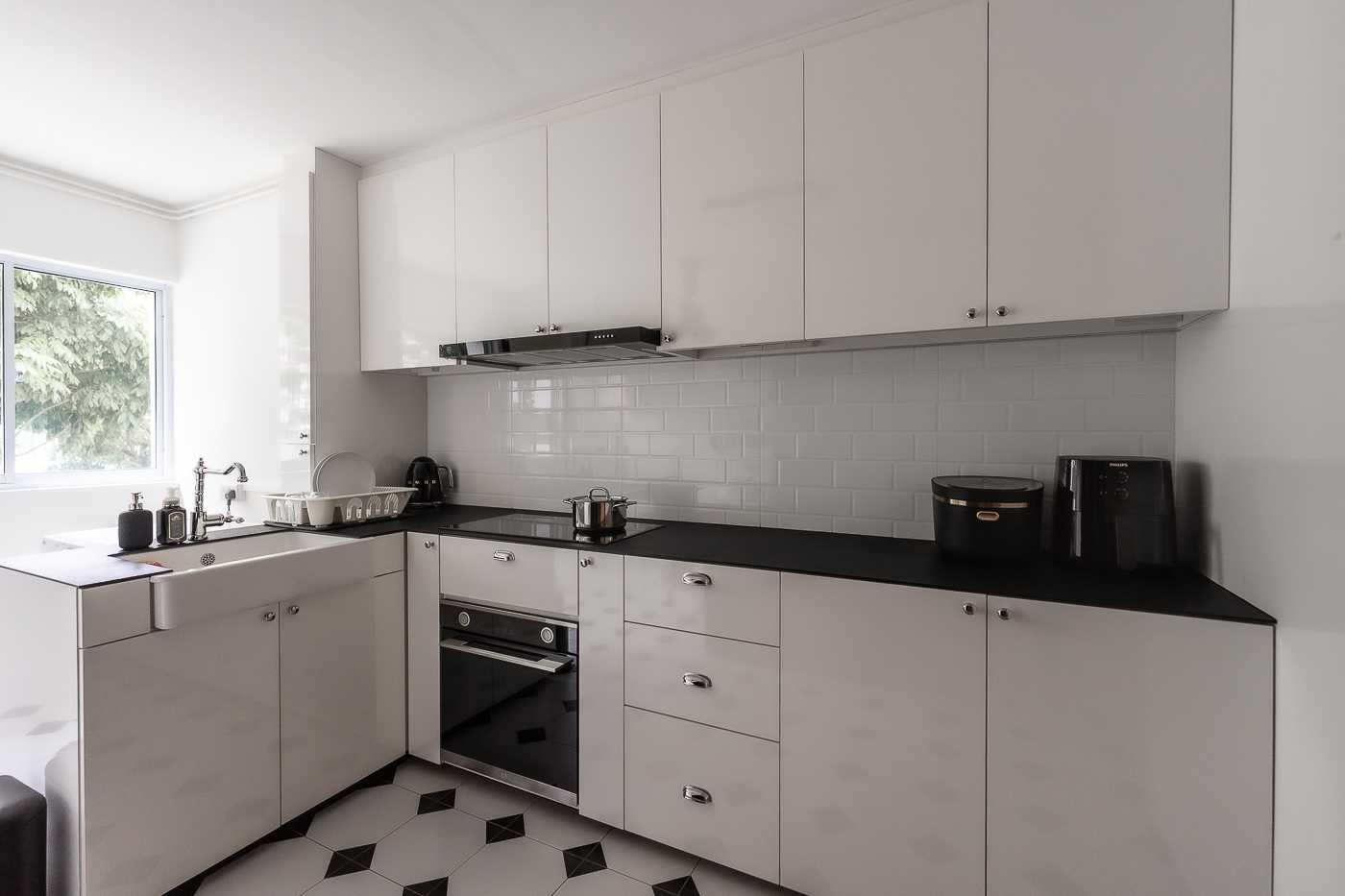 Modern Kitchen with Countertop and Kitchen Window