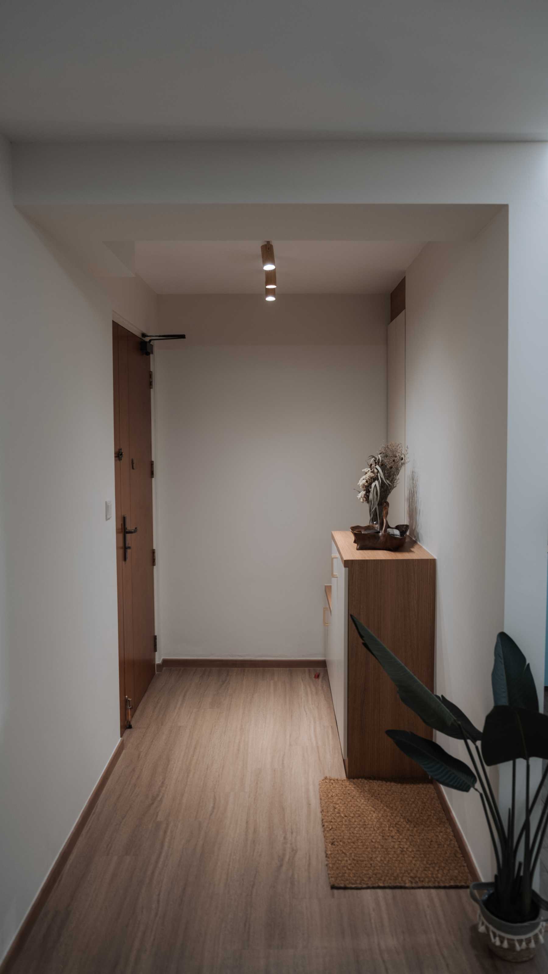 Scandinavian Entryway with Shoe Rack and Console Table