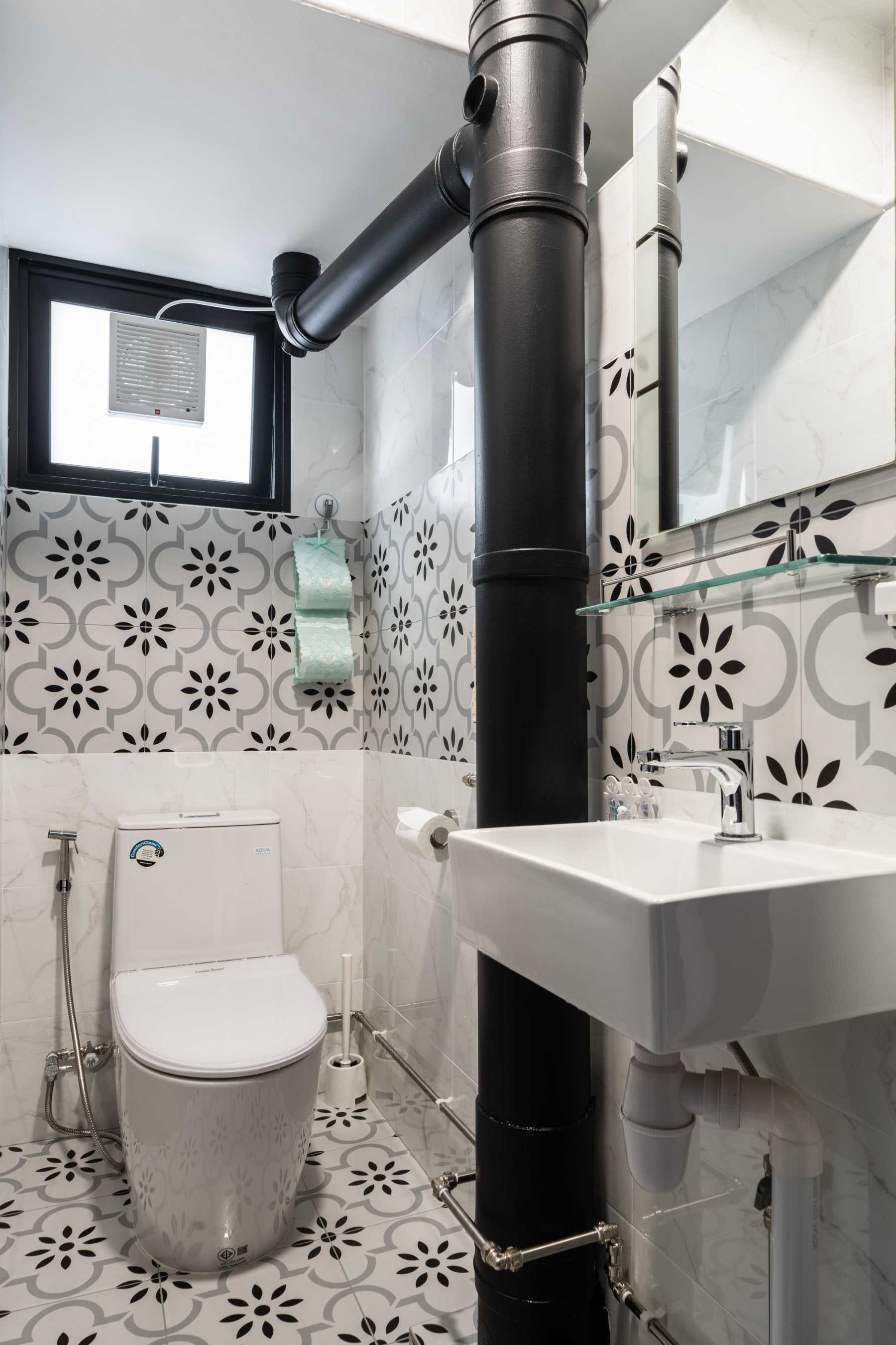 Modern Bathroom with Herringbone Tiling and Shower Screen