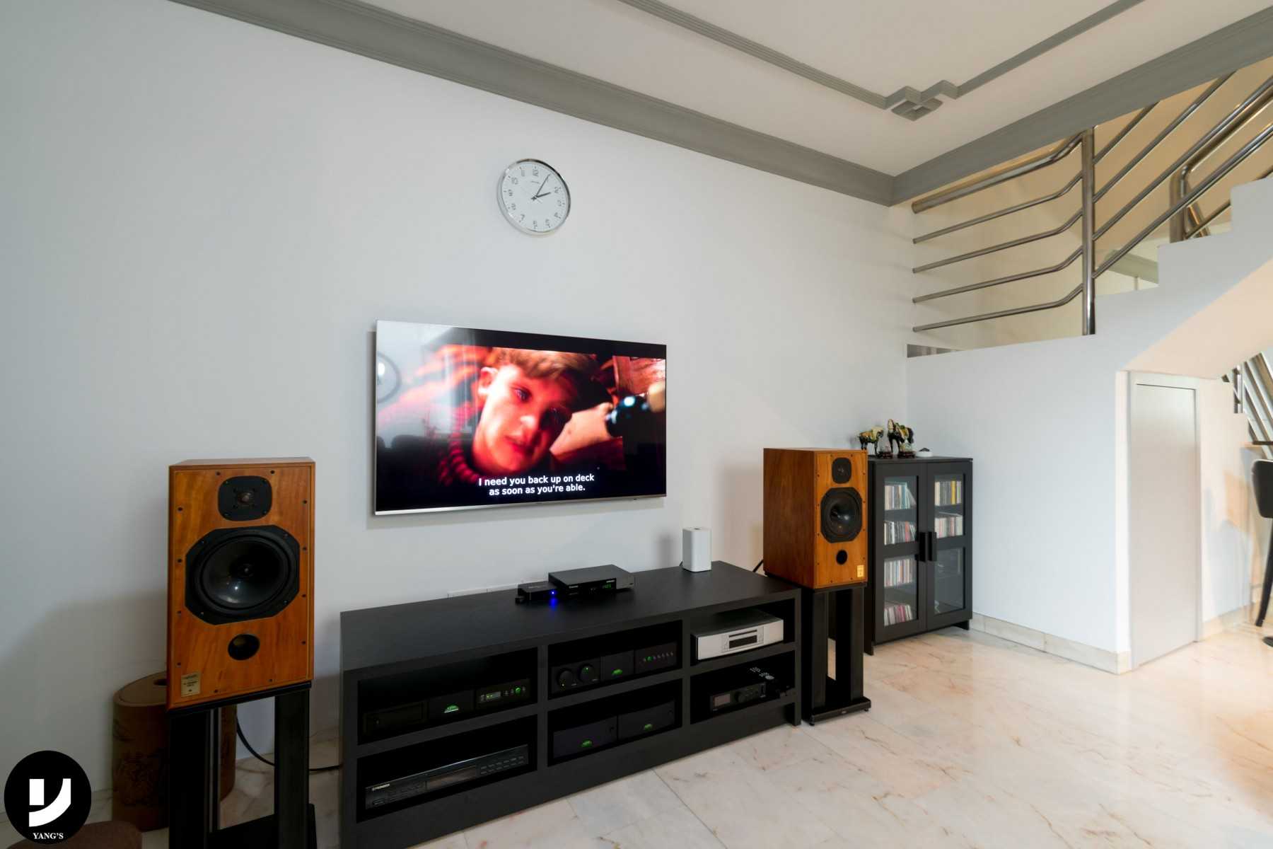 Contemporary Living Room with Bookshelf and TV