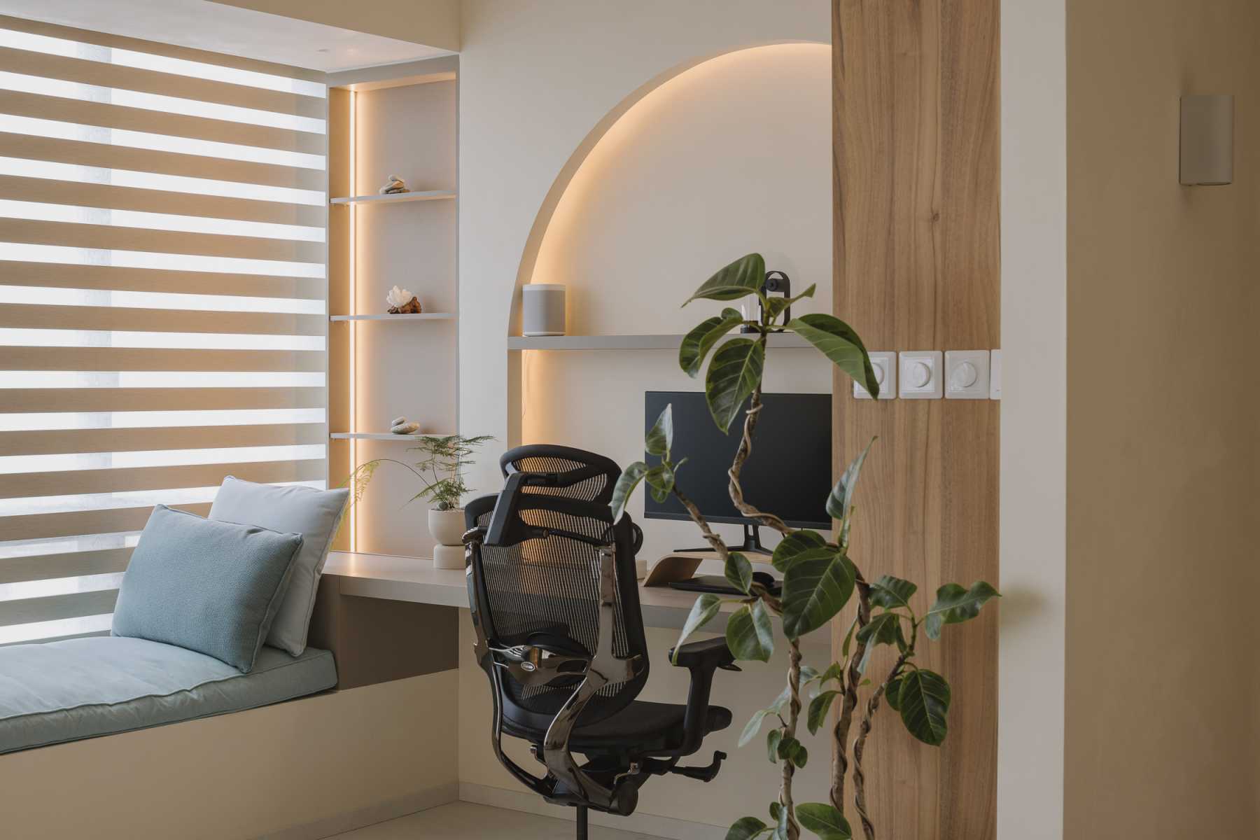 Contemporary Home Office with Bay Window and Desk