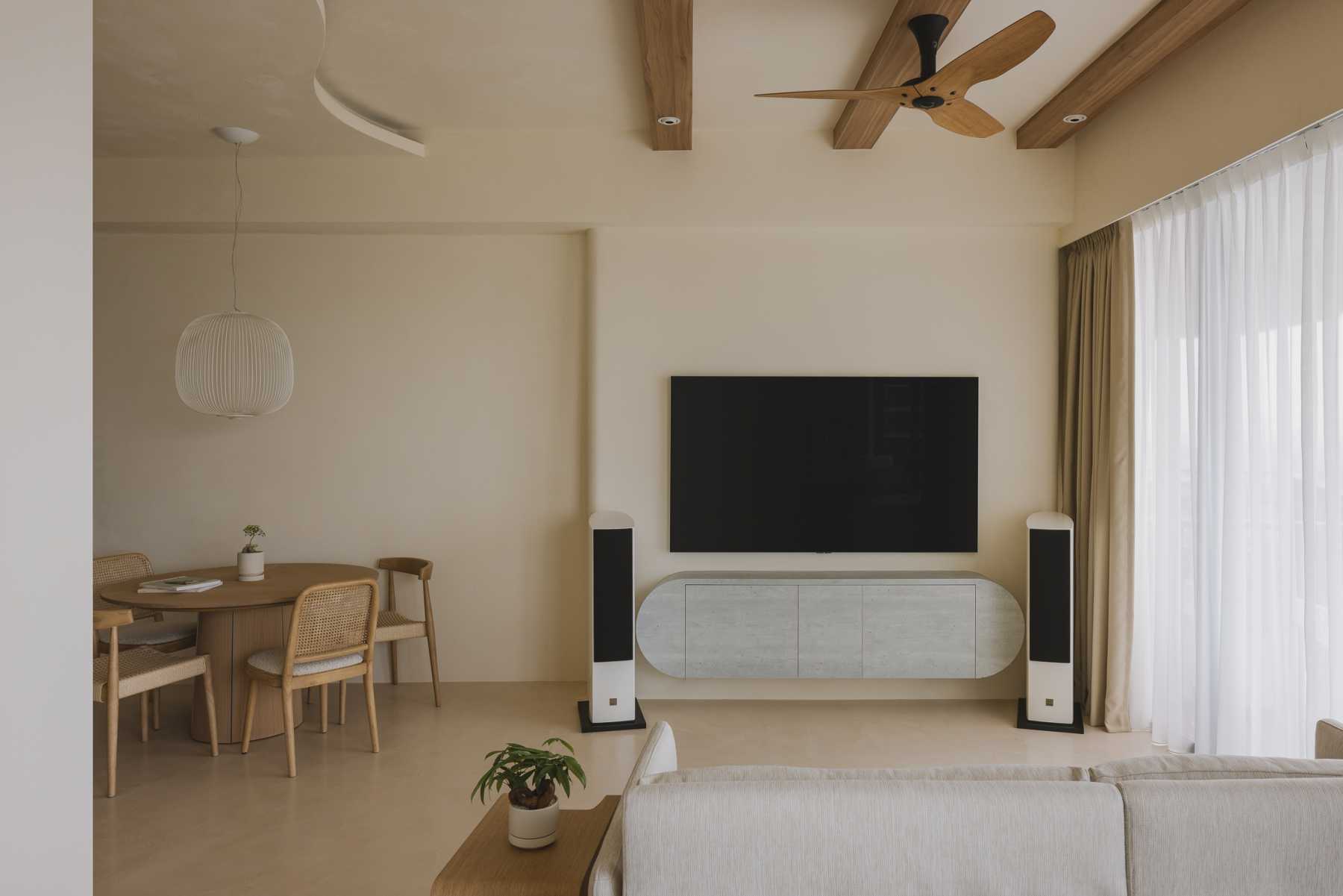 Contemporary Living Room with TV Console and Ceiling Fan