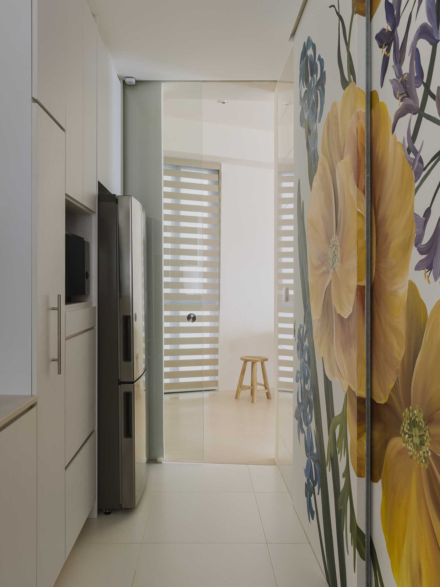 Contemporary Kitchen with Kitchen Island and Artwork