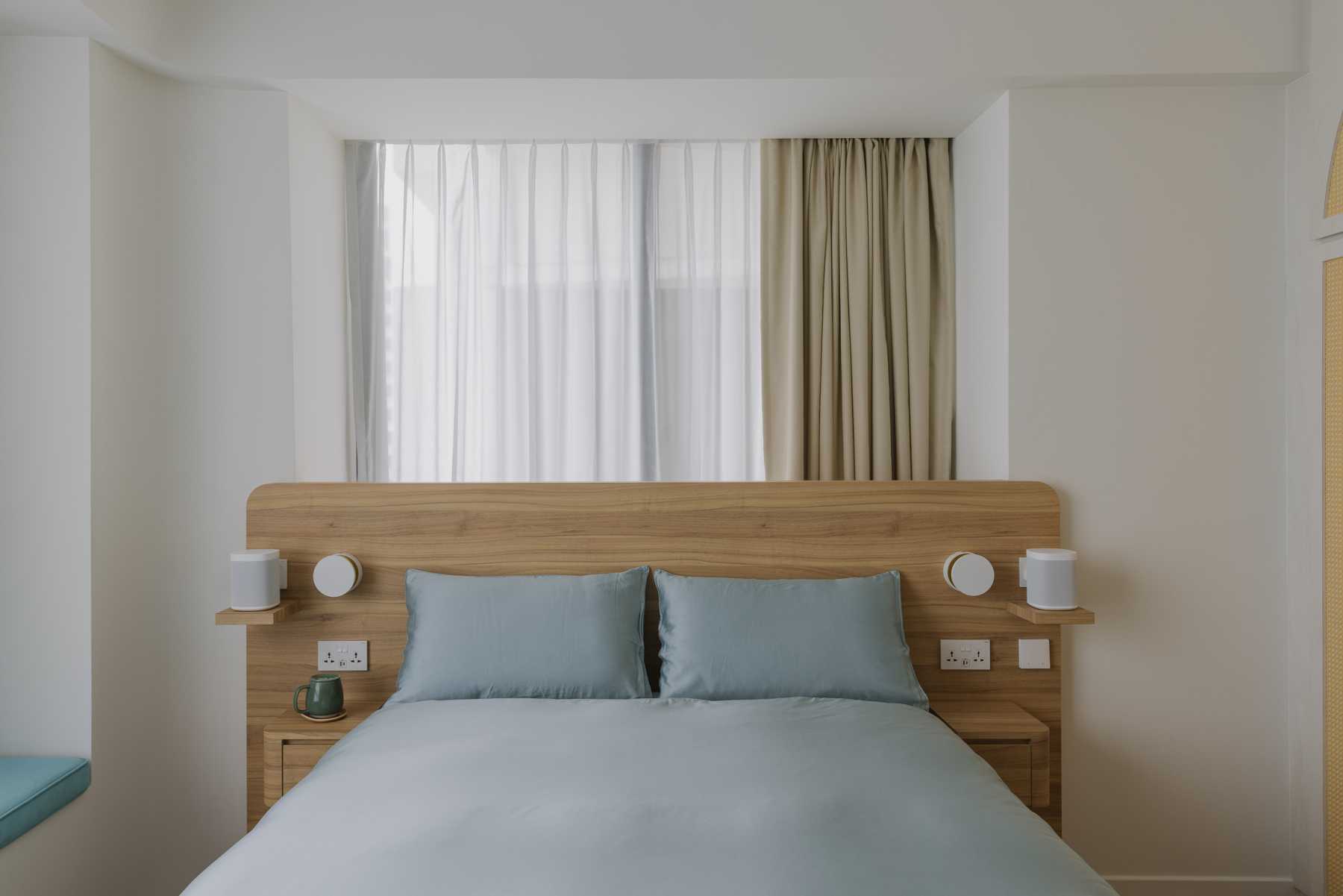 Contemporary Bedroom with Bay Window and Curtain