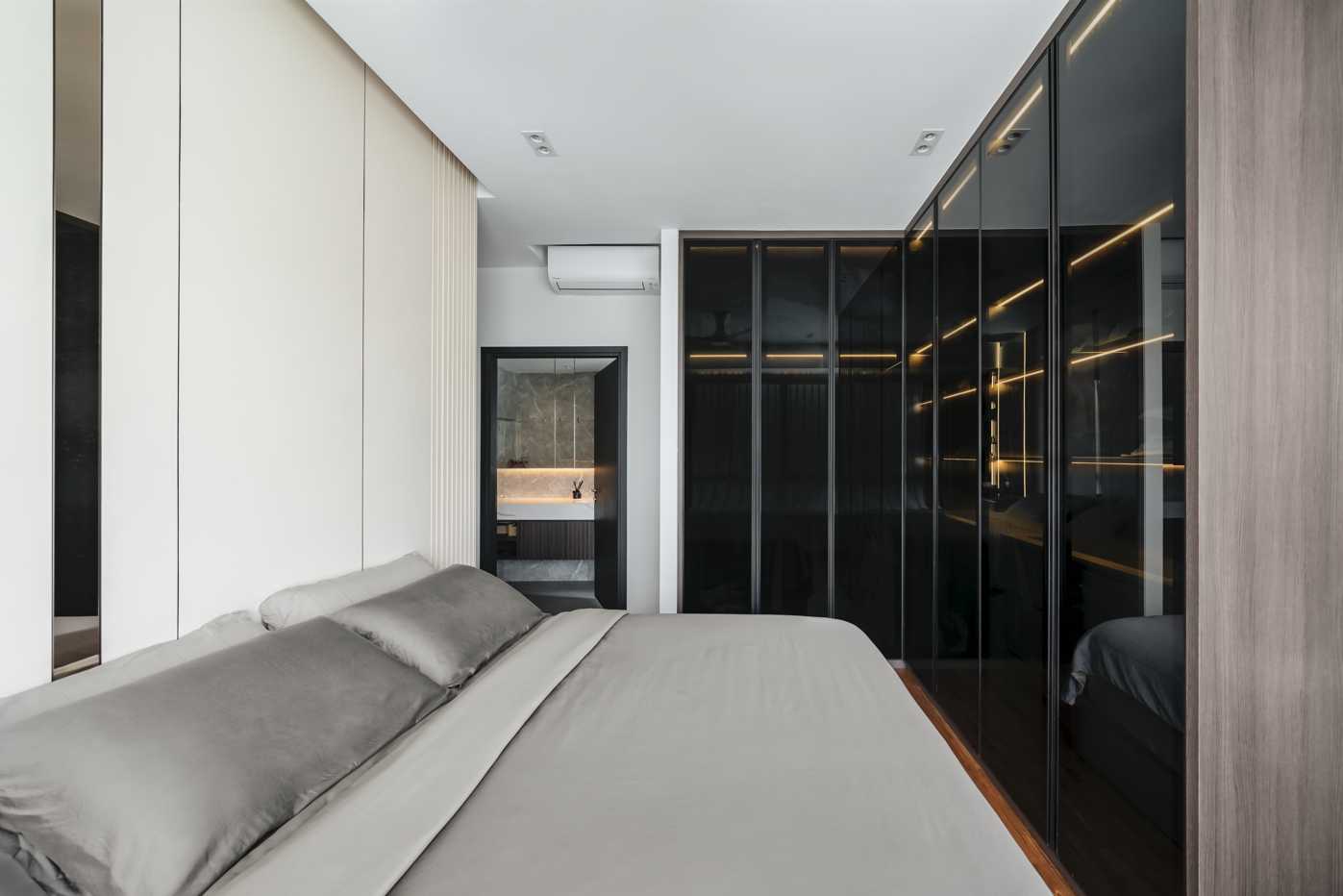 Contemporary Bedroom with Feature Wall and Wardrobe